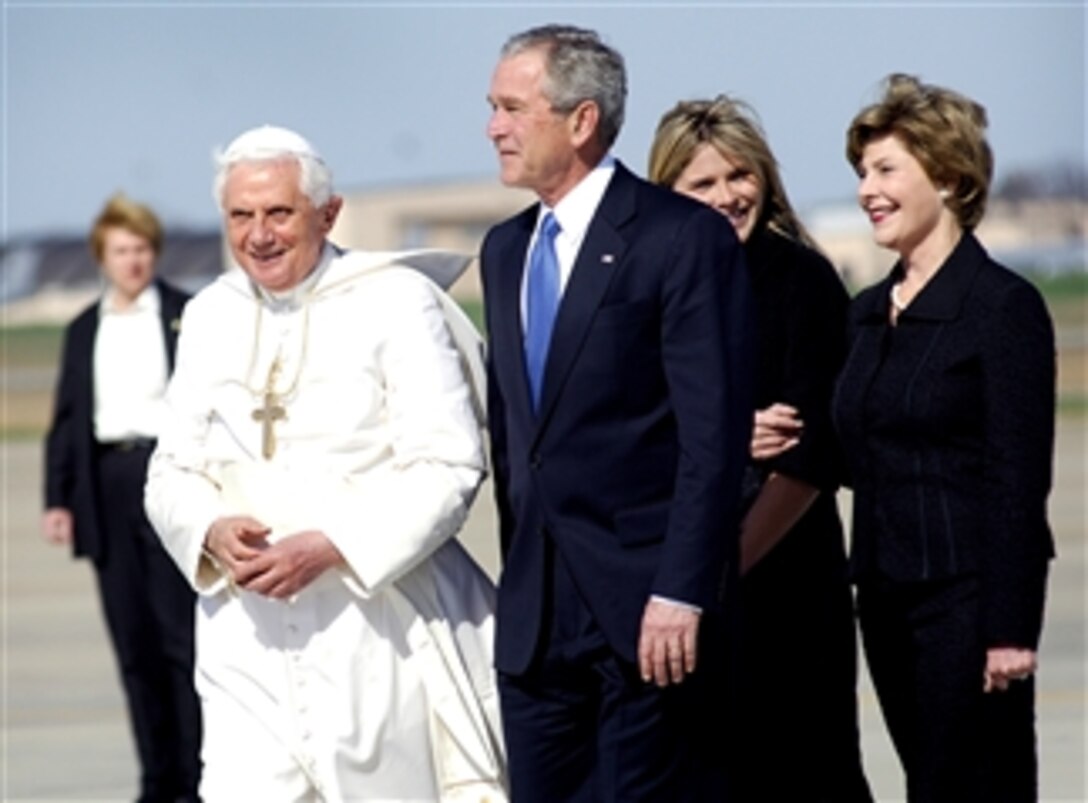 Pope Benedict XVI is greeted by President George W. Bush, Laura Bush, right, and their daughter, Jenna Bush, at Andrews Air Force Base, Md., April 15, 2008, as he begins his six-day trip to the United States. The Pope will meet with Bush at the White House and celebrate Mass at the Nationals Park in Washington, D.C.  