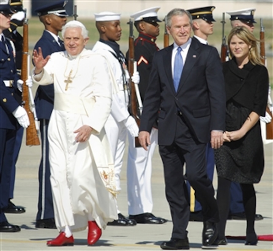 President George W. Bush and his daughter, Jenna Bush, greet Pope Benedict XVI on Andrews Air Force Base, Md., April 15, 2008, as he begins a six-day trip to the United States. The Pope will meet with Bush at the White House and celebrate Mass at the Nationals Park in Washington, D.C.  