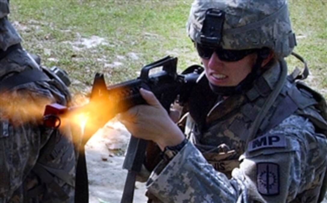 1st Lt. Melissa Lewis takes out a simulated sniper during a United Nations peacekeeping exercise in Rajendrapur Cantonment, Bangladesh, April 12, 2008. She is the platoon leader of 1st Platoon, 57th Military Police Company, 8th Military Police Brigade. 