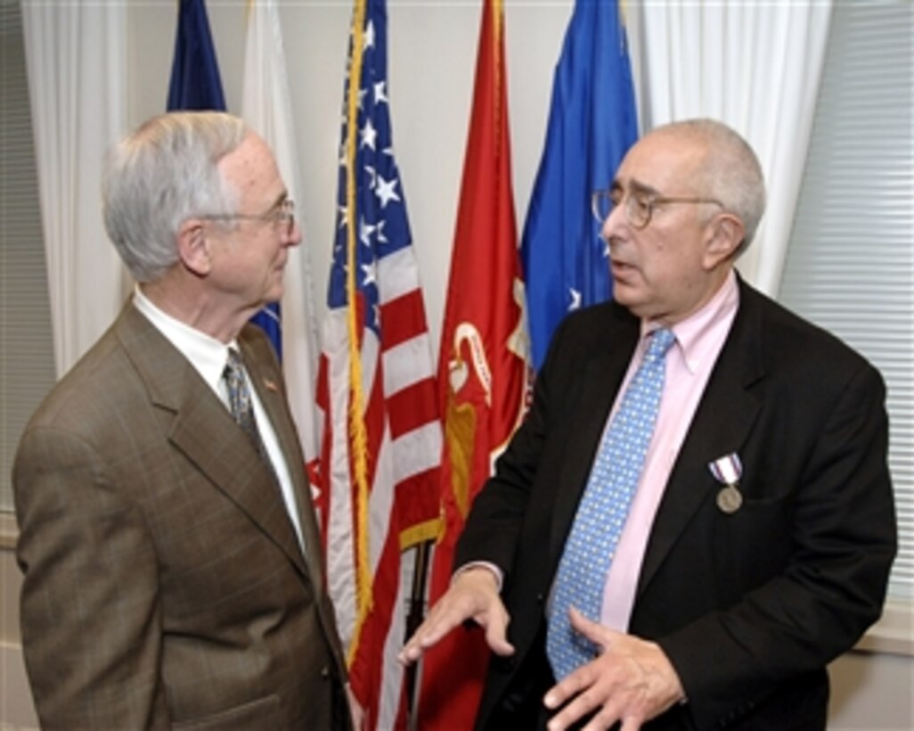 Deputy Secretary of Defense Gordon England talks with author, actor and commentator Ben Stein following his presentation of the Secretary of Defense Medal for Exceptional Public Service in the Pentagon on April 15, 2008.  Stein received the award, DoD's highest commendation for public service, in recognition of his passionate support of our armed forces and in particular the program Tragedy Assistance Program for Survivors.  All proceeds from Stein's book "The Real Stars:  In Today's America, Who Are the True Heroes?" have been donated to the organization, which provides grief counseling to the families of fallen military personnel.  The organization's founder and director Bonnie Carroll was also awarded the medal.  