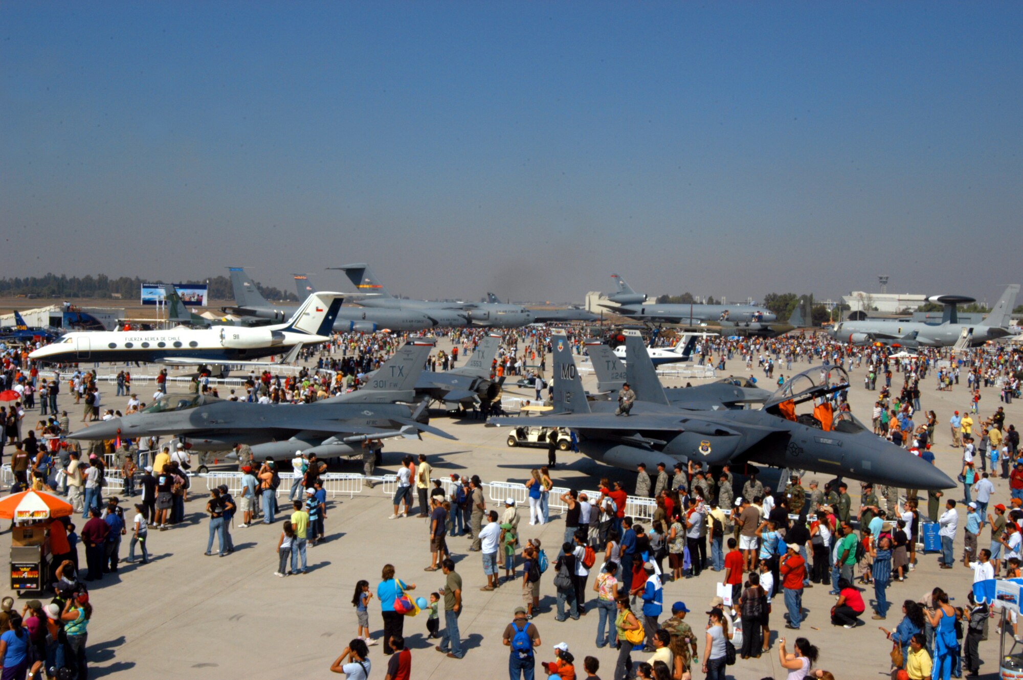 SANTIAGO, Chile -- U.S. Air Force aircraft get a close look by patrons of FIDAE 2008, one of the largest air shows in South America April 5. A host of other Airmen and aircraft were part of the air show and Exercise Newen 2008.  The exercise emphasizes cooperation and partnerships between the U.S. and Chilean militaries. Fighters and tankers flew in the exercise along side Chilean counterparts.  (U.S. Air Force photo/Master Sgt. Jason Tudor)