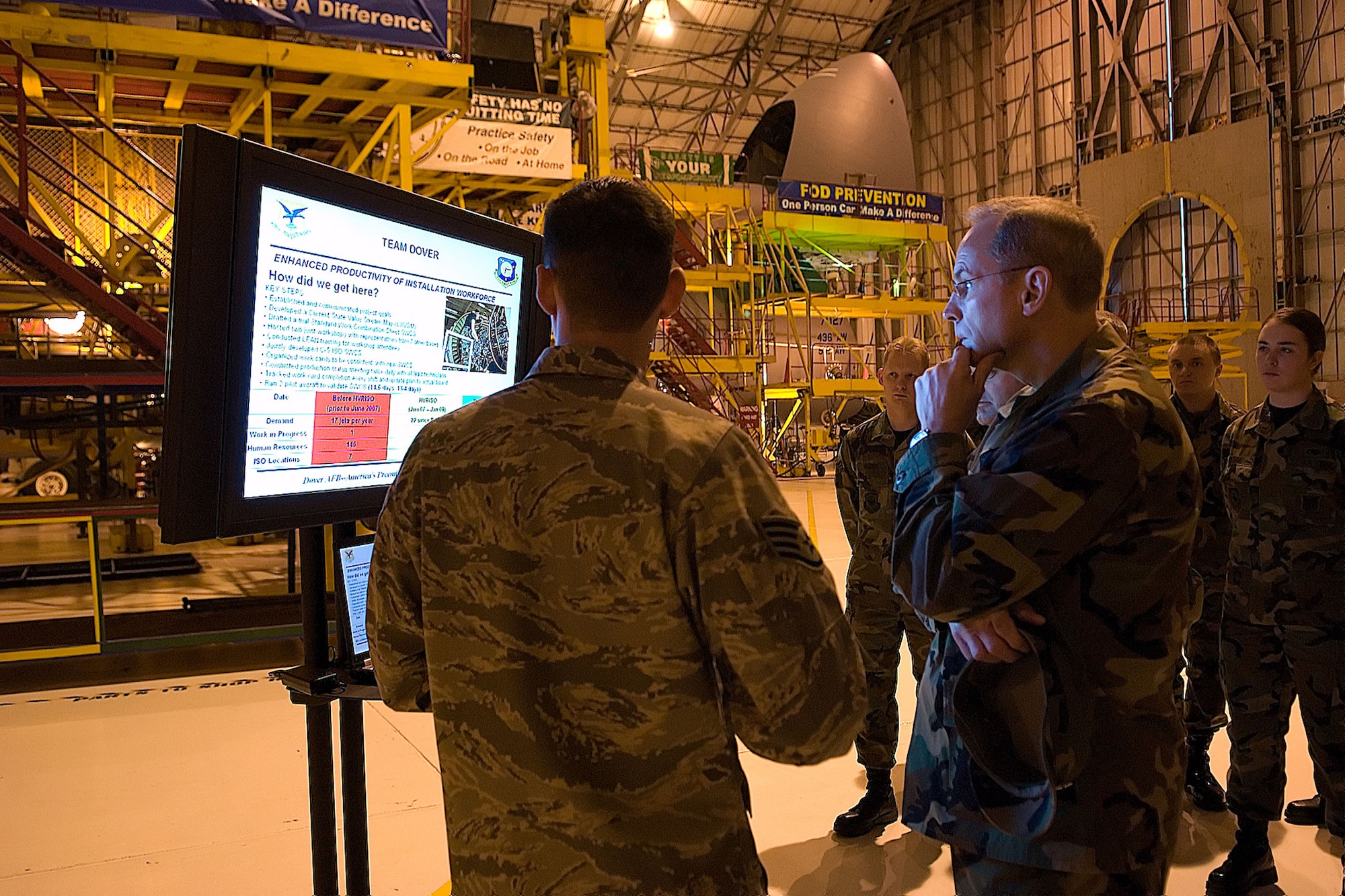 Staff Sgt. Michael Wolbert, 436th Maintenance Squadron, isochronal craftsman, briefs Maj. Gen. Mark Anderson, Mobilization Assistant to Deputy Chief of Staff, Installations and Support, during the Installation Excellence Selection Board visit Jan. 27-29. (U.S. Air Force Photo/Jason Minto)