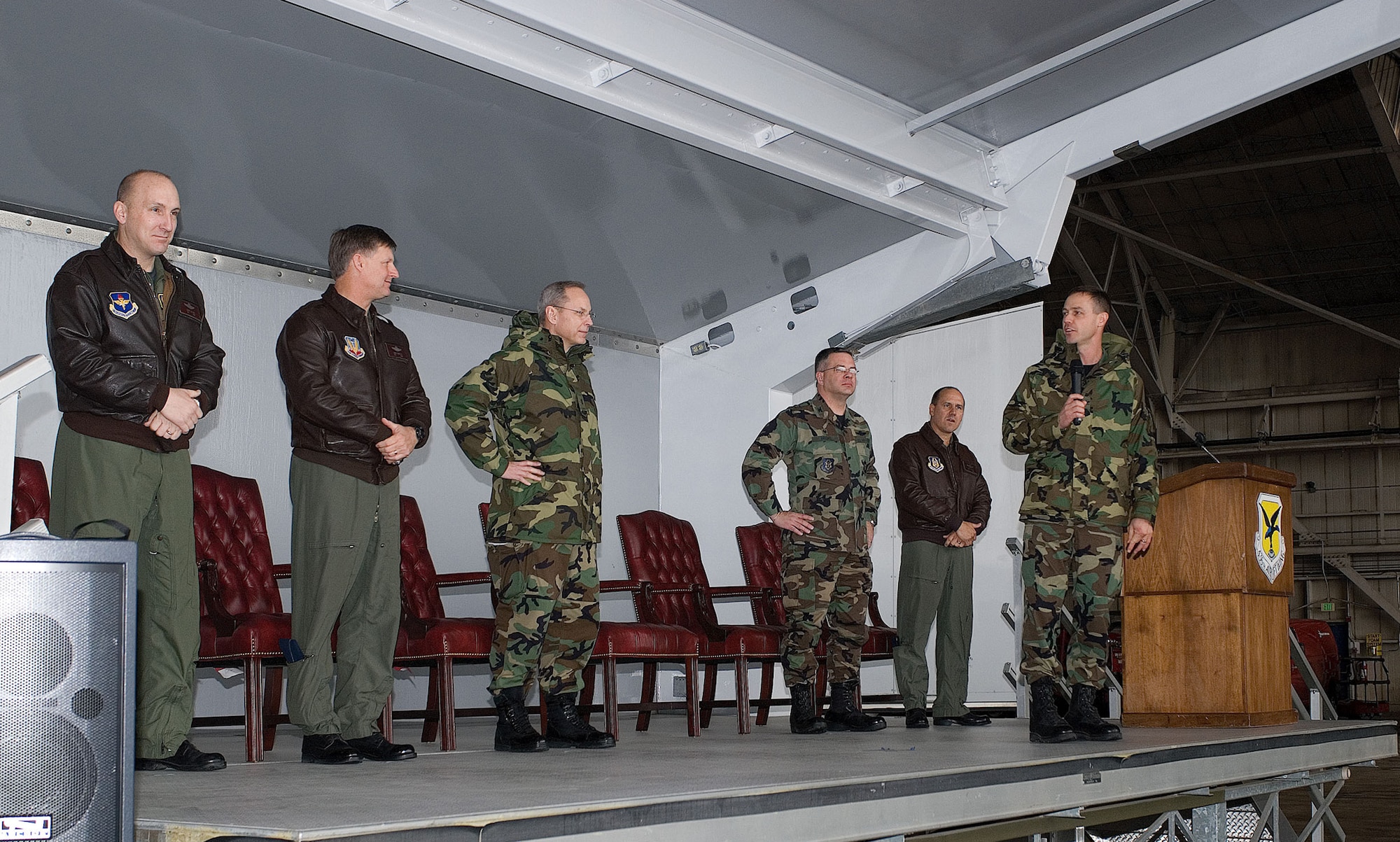 Col. Steven Harrison, 436th Airlift Wing commander, addresses the members of Team Dover and the Installation Excellence Selection Board members at the 2008 Air Force Commander in Chief’s Installation Excellence Award victory rally Jan. 29.  Col. Randal Bright, 512th AW commander (fourth from left) joins the IESB members onstage, from left: Col. David Allvin, 97th AMW commander, Col. Michael Bartley, 99th ABW commander, Maj. Gen. Mark Anderson, Mobilization Assistant to Deputy Chief of Staff, Installations and Support, and Col. Randall Falcon, 482nd FW commander. (U.S. Air Force Photo/Roland Balik)