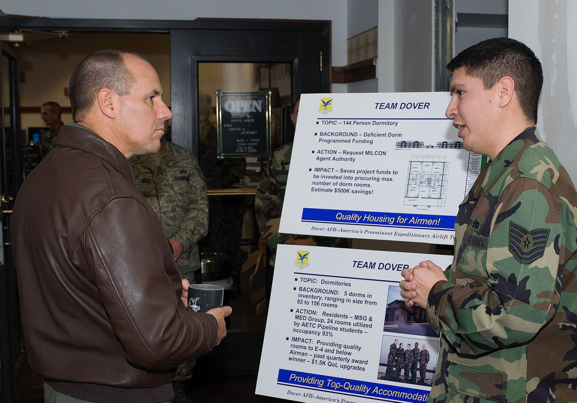 Tech. Sgt. Richard Ortega , 436th Civil Engineer Squadron, briefs Col. Randall Falcon, 482nd Fighter Wing commander, Homestead Air Force Base, Fl., on the quality of life improvements Team Dover has made in the dormitories during the Installation Excellence Selection Board visit, Jan. 27-29. (U.S. Air Force Photo/Roland Balik)