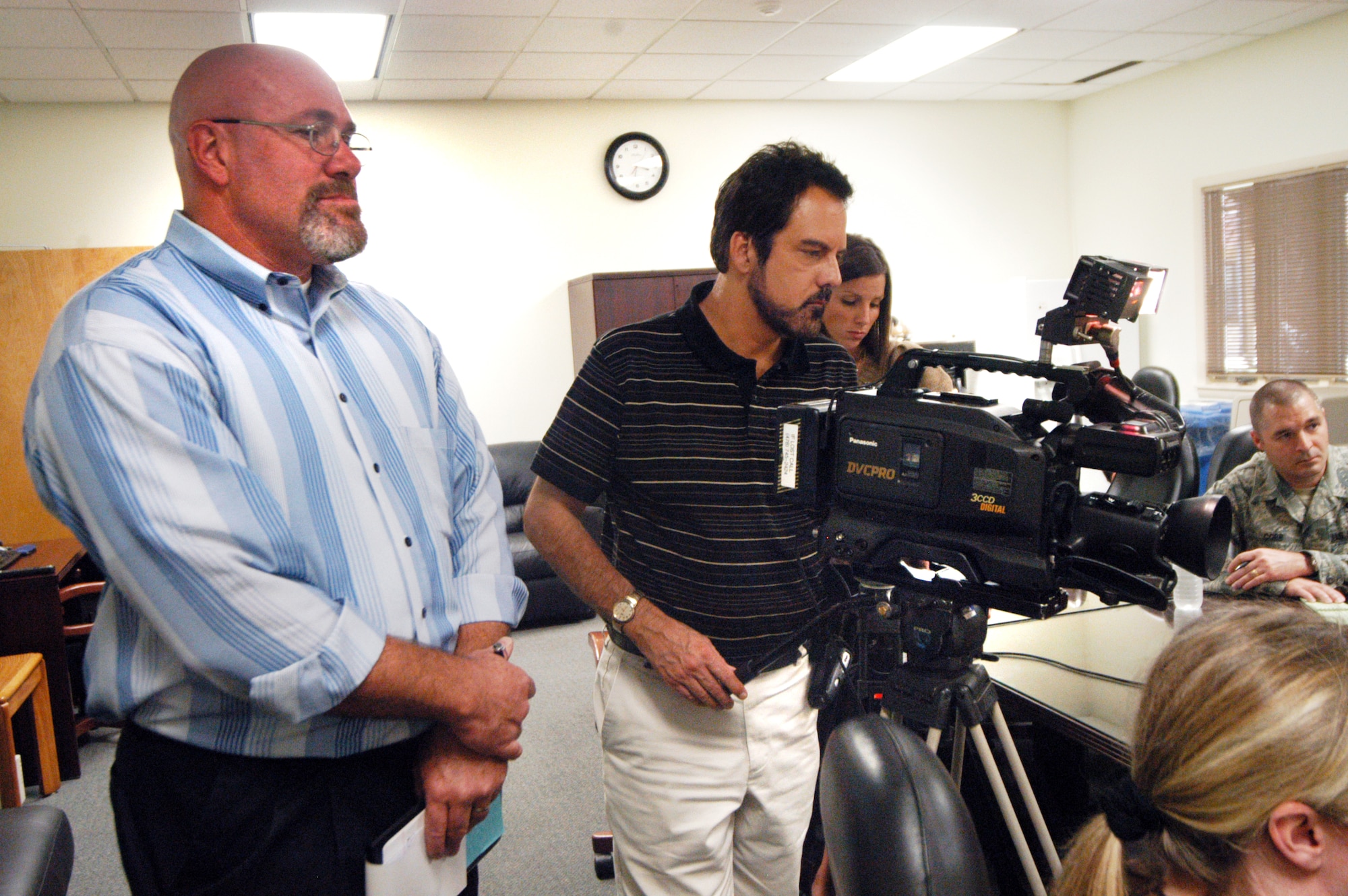 At left, George Jozens, 78th Air Base Wing Media Specialist, coordinates a media opportunity with Chief Master Sergeant of the Air Force, Rodney McKinley Oct. 11. U. S. Air Force photo by Sue Sapp    