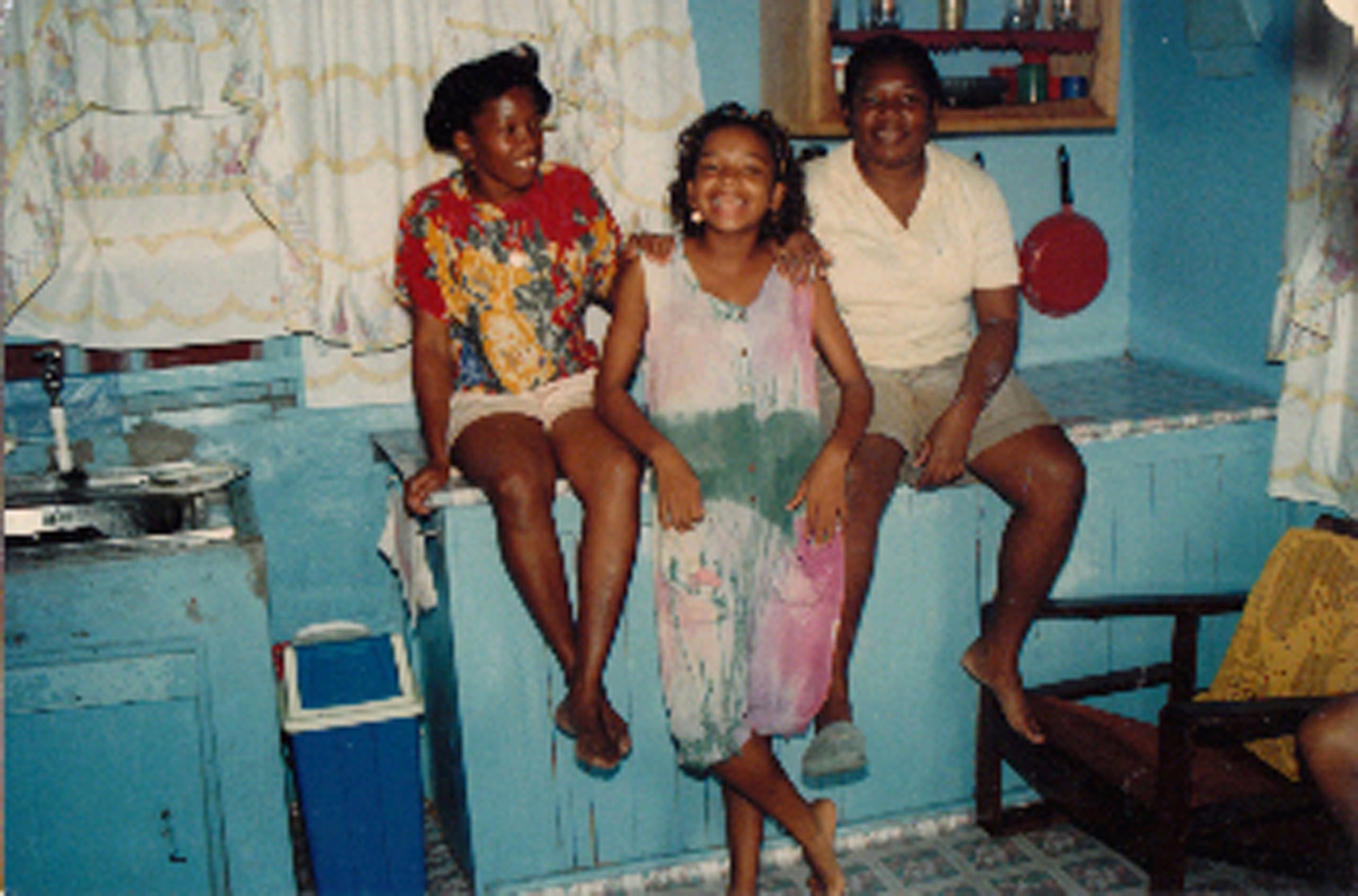 Senior Airman Cassandra Obermuller Brandon (center) was born and raised in Guyana, a South American country next to Brazil and Venezuela. She moved to New York City with her father in 1991, but split her time between the two countries throughout the year. (Courtesy photo)