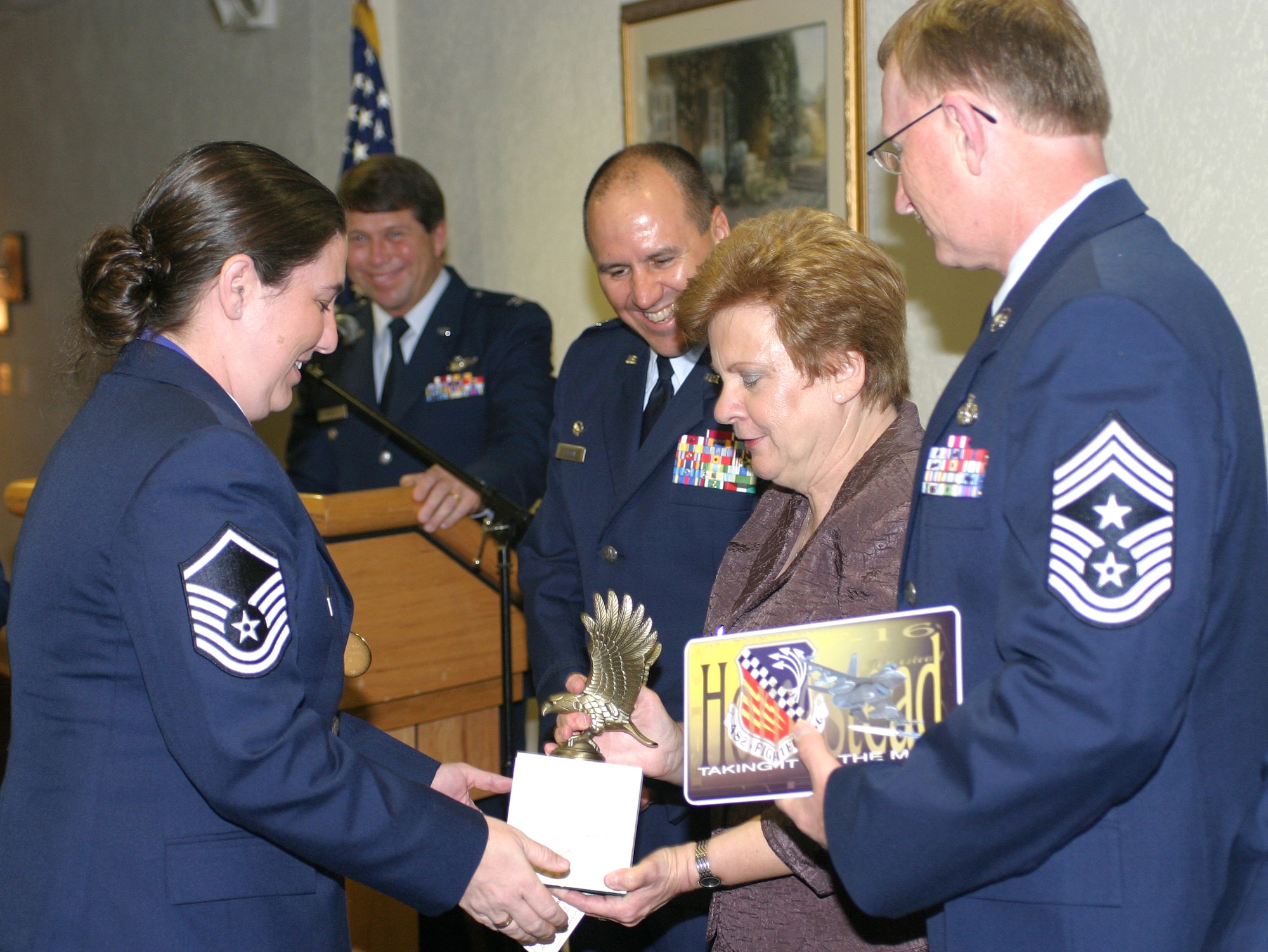 Master Sgt. Tabitha Neville, 70th Aerial Port Squadron, goes through a congratulatory line after being named the Homestead Air Reserve Base 2007 Senior NCO of the Year at the Annual Award Banquet on April 12. The event was co-sponsored and hosted by the 482nd Fighter Wing and the Military Affairs Committee of the Greater Homestead/Florida City Chamber of Commerce, and recognized the best and brightest of the base. (U.S. Air Force photo/Tech. Sgt. Paul Dean)