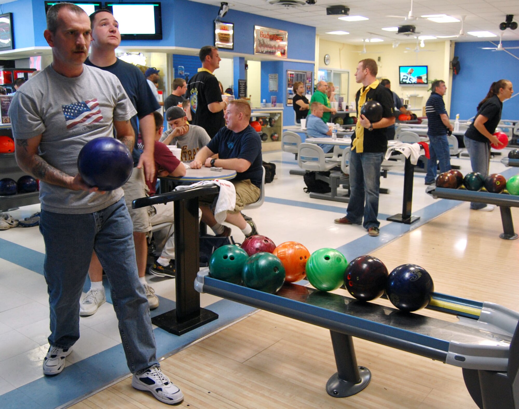 LAUGHLIN AIR FORCE BASE, Texas –John Rogers, a 47th Force Support Squadron team member, focuses on the pins before taking his turn during the base bowling tournament at Cactus Lanes April 10. After each team in the tournament played three games, the total pin count was the deciding factor for the champions of the competition. (U.S. Air Force photo by Airman 1st Class Sara Csurilla)