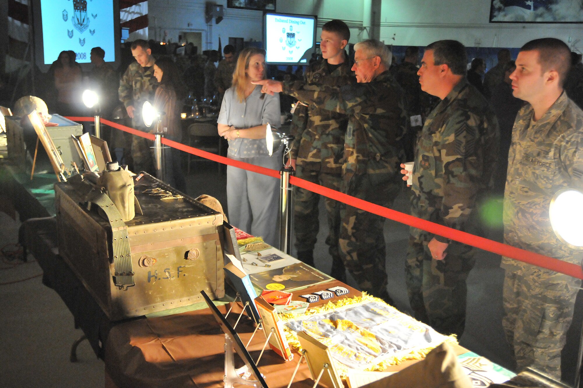 Robert Gaylor, fifth Chief Master Sgt. of the Air Force observes a heritage display at the 2008 Enlisted Dining Out at the 3-Bay hangar, April 11. The theme of the dining out was "Transforming the Warrior Airman." Chief Master Sgt. of the Air Force Gaylor was the guest of honor and speaker at the Enlisted Dining Out. (U.S. Air Force photo/John Turner)