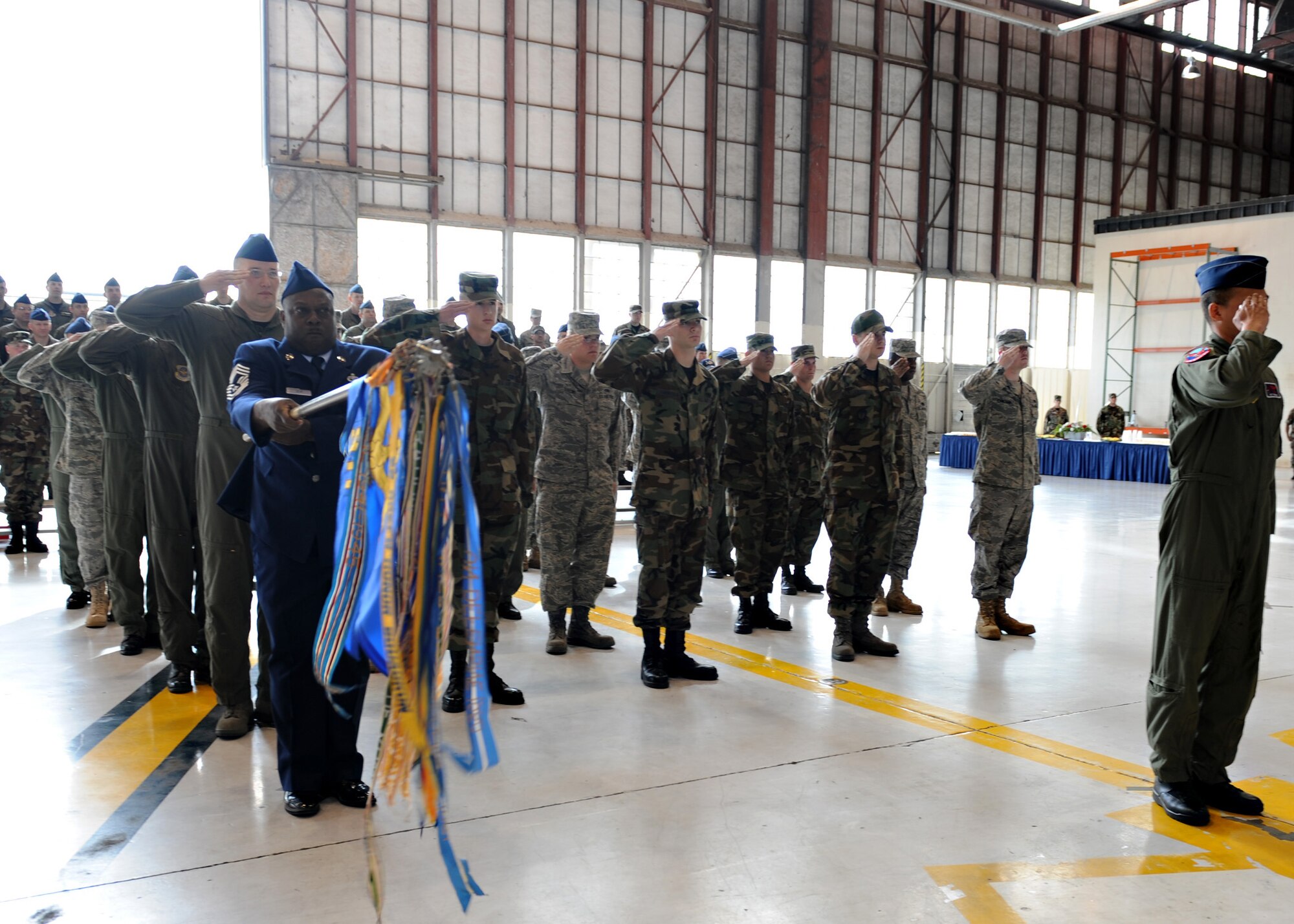 Lt. Colonel Art Primas, 911th ARS Operations Officer, leads the squadron formation at the activation of the Air Force's first active-associate tanker squadron on Saturday, April 12, 2008. The 911th Air Refueling Squadron will supply active-duty aircrew and maintainers to assist the Air Force Reserve's 916th ARW at Seymour Johnson AFB. CMSgt Garry Seay holds the guideon for the formation.

(US Air Force photo by Airman First Class Salma Din)(Released)