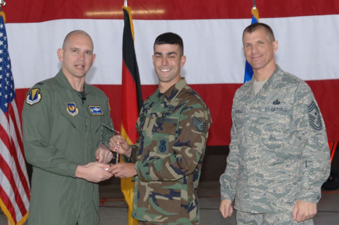 Staff Sgt. David Edwards, 786th Security Forces Squadron, was awarded the 86th Airlift Wing NCO of the Quarter, April 16 by Col. Cam Torrens, 86th Airlift Wing vice commander, and Chief Master Sgt. Steve McDonald, 86th AW command chief. 
(U.S. Air Force photo by Airman 1st Class Tony Ritter) 
