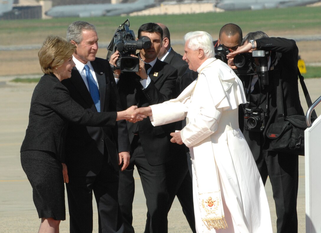 Mrs Laura Bush greets Pope Benedict XVI upon his visit to Andrews Air Force Base, MD hosted by the 316th Wing and the Air Force District of Washington on April 15, 2008 beginning his weeklong trip to the United States. The Pontiff selected the 256th pope on April 19, 2005, will meet with President George W. Bush at the White House, address the Presidents of Roman Catholic Colleges and Universities, and celebrate mass at Nationals Park in Washington D.C. and Yankee Stadium in New York City.  (U.S. Air Force photo by Tech Sgt. Craig Clapper)