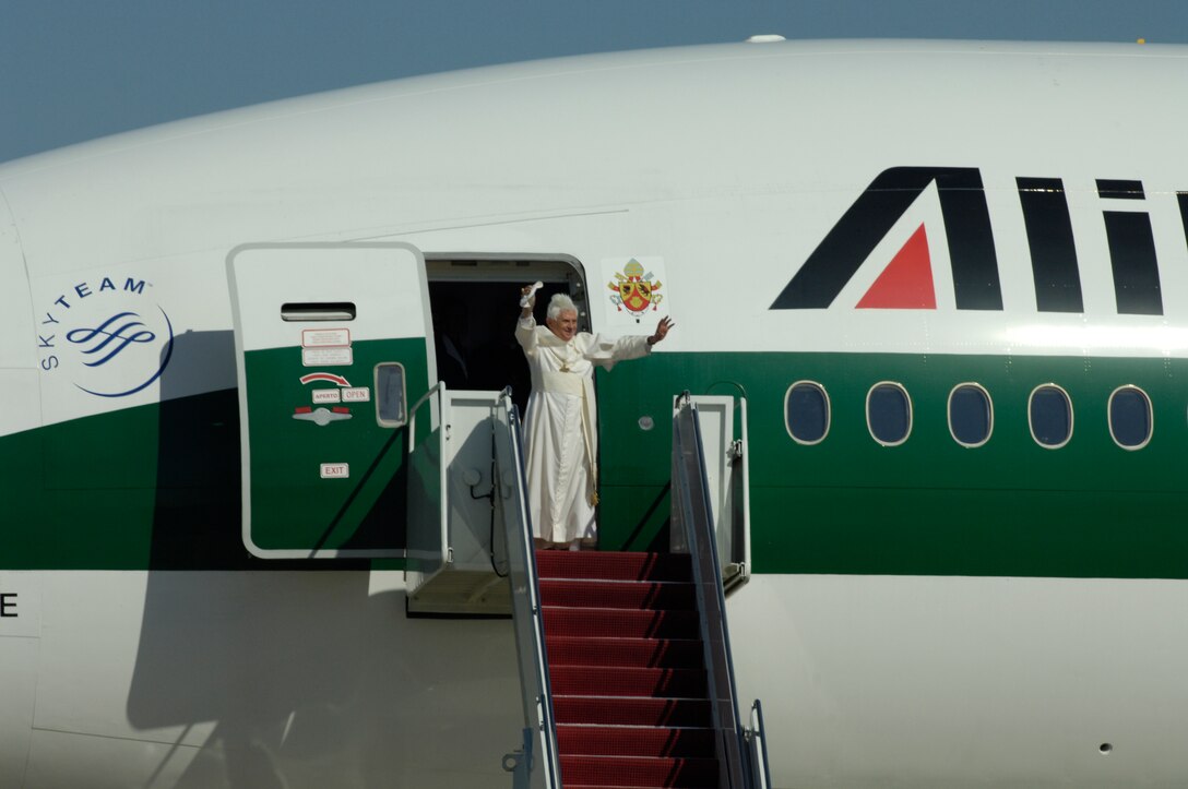 Pope Benedict XVI hosted by the 316th Wing and the Air Force District of Washington, waves to the crowd upon his arrival at Andrews Air Force Base, Md., Apr 15, 2008, beginning his weeklong trip to the United States.  The Pontiff, selected 265th pope on April 15, 2008, will meet with President George W. Bush at the White House, address the presidents of Roman Catholic Colleges and Universities, and hold mass at Nationals Park in Washington D.C. and Yankee Stadium in New York City.   (U.S. Air Force photo by Senior Airman Renae L. Kleckner)(released)