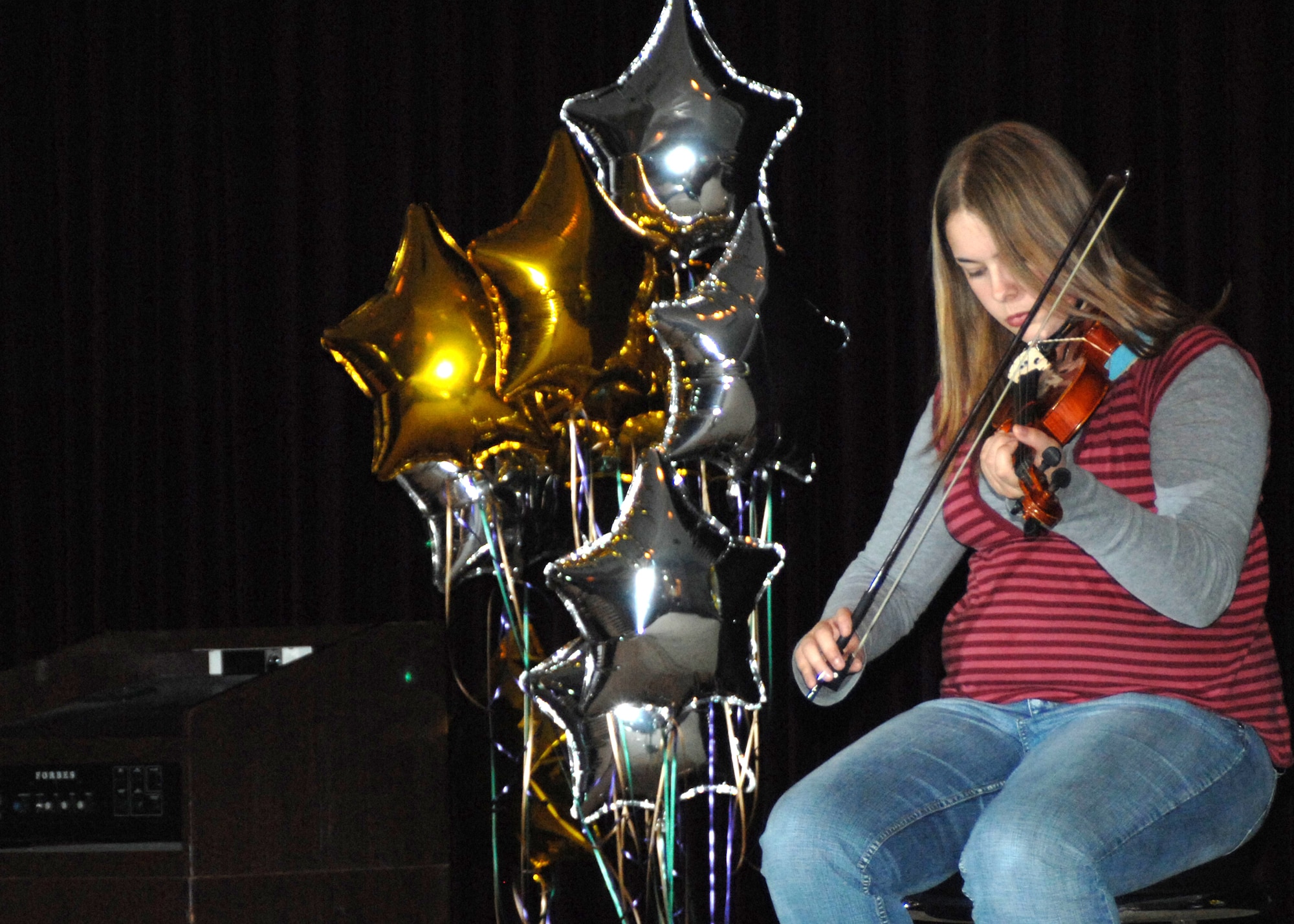 Kayla Crouch performed "Heart and Soul" by Hoagy Carmichael, on violin and won first place Instrumental Solo for the 12-18 age group. (U.S. Air Force photo by Senior Airman Jason Burton)