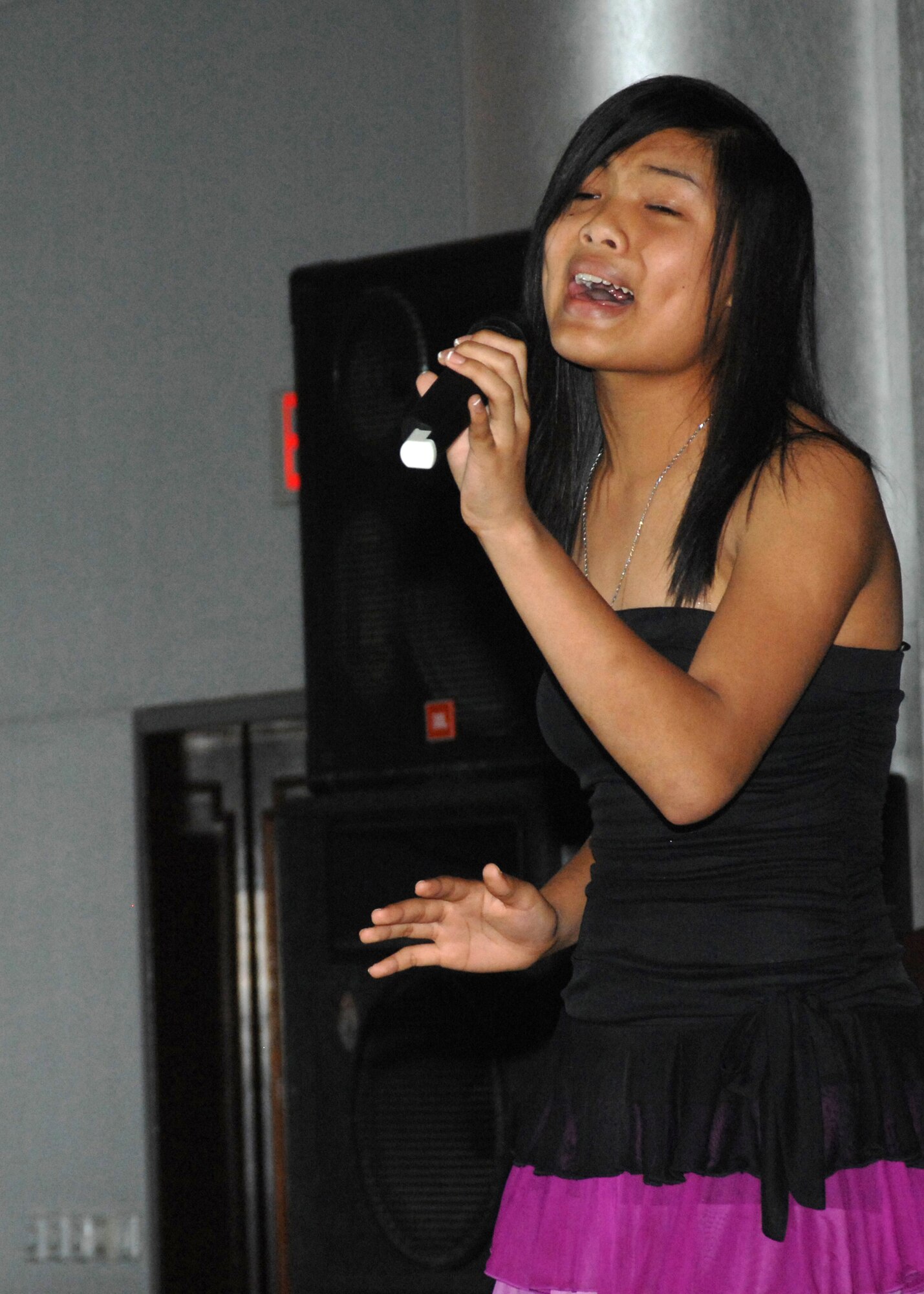 Reanne Acasio sang "Don't Cry Out Loud" by Melissa Manchester, and won first place Female Vocalist and Best in Show for the 12-18 age group for the 2008 Unites States Air Forces in Europe Youth talent Contest April 10 at the Incirlik Consolidated Club.(U.S. Air Force photo by Senior Airman Jason Burton)