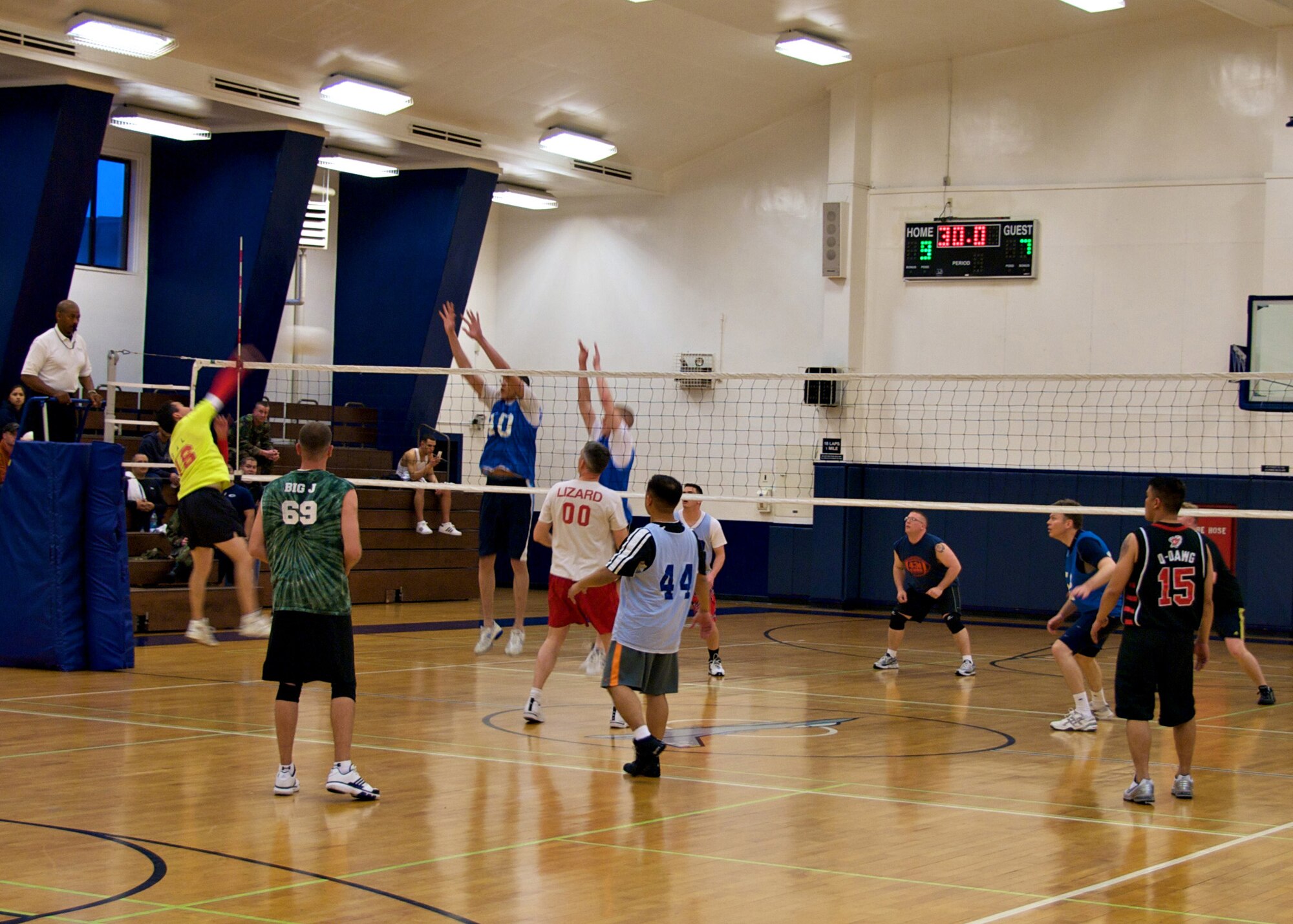 MISAWA AIR BASE, Japan -- The 373rd Intelligence Group  and 35th Civil Engineer Squadron go head to head during the intramural volleyball championship at the Potter Fitness Center April 14, 2008. The 35th CES defeated the 373rd in both games, 25-22 and 25-18. (U.S. Air Force photo by Senior Airman Chad Strohmeyer)
