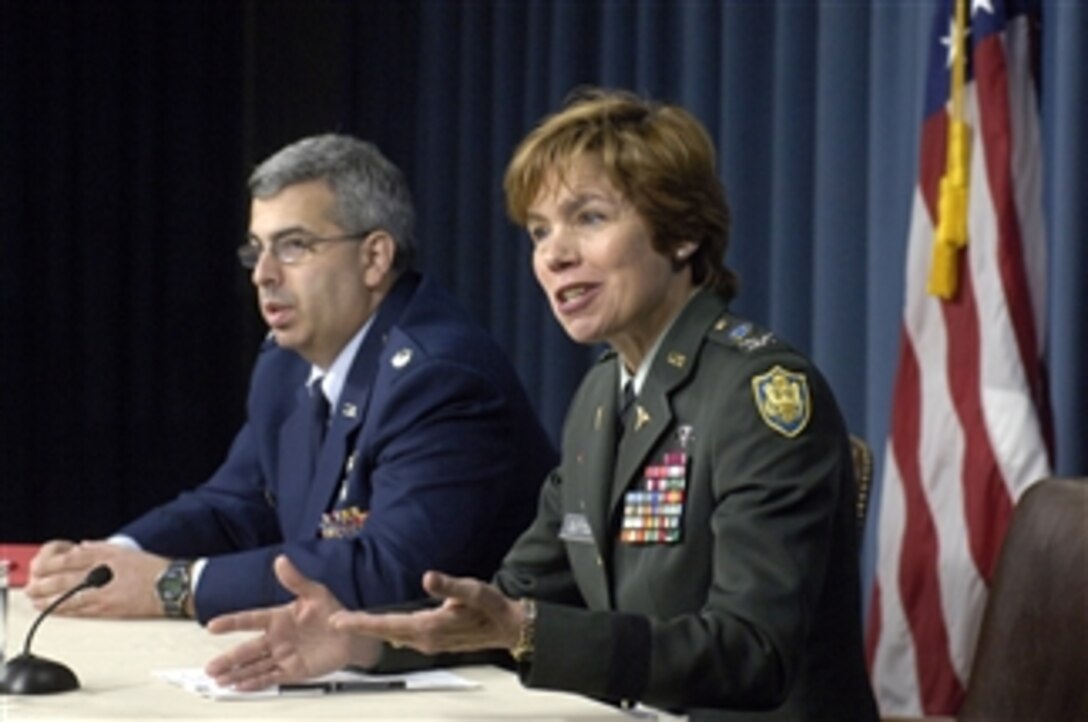 Director of the Defense Center of Excellence for Traumatic Brain Injury/Post Traumatic Stress Disorder Col. Loree K. Sutton (right), U.S. Army, and Director of the Defense Veterans Brain Injury Center Lt. Col. Mike Jaffee, U.S. Air Force, address the findings and recommendations in a RAND study on brain injuries and stress disorders being suffered by troops in Afghanistan and Iraq during a media roundtable in the Pentagon on April 17, 2008.  
