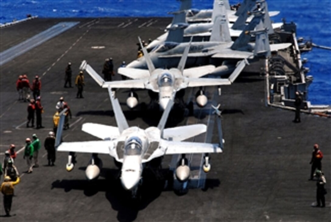 U.S. Navy aircraft prepare to launch from the nuclear-powered aircraft carrier USS Nimitz, April 15, 2008. Nimitz is operating as part of the U.S. 7th Fleet in the western Pacific and Indian oceans.