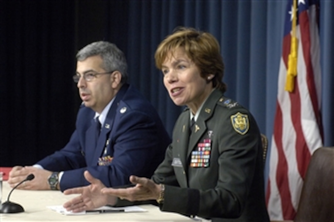 Director of the Defense Center of Excellence for Traumatic Brain Injury/Post Traumatic Stress Disorder Col. Loree K. Sutton (right), U.S. Army, and Director of the Defense Veterans Brain Injury Center Lt. Col. Mike Jaffee, U.S. Air Force, address the findings and recommendations in a RAND study on brain injuries and stress disorders being suffered by troops in Afghanistan and Iraq during a media roundtable in the Pentagon on April 17, 2008.  