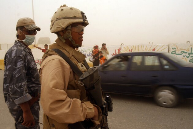 Iraqi citizens entering Fallujah, whether walking or driving, must have a valid identification when approaching an entry control point. While Coalition forces still remain at ECPs, Iraqi Police and guards are taking a more active role in providing security for these posts.