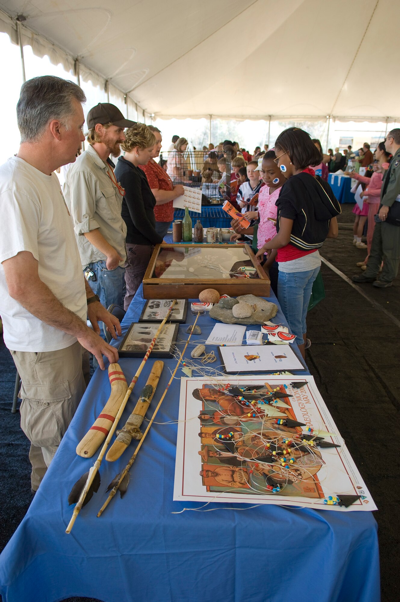 People attending the annual Earth Day celebration here April 17 receive information about how they can help conserve and protect the planet. Edwards' Environmental Management holds Earth Day every year to inform the community about the base's conservation efforts. (Air Force photo by Mike Cassidy)