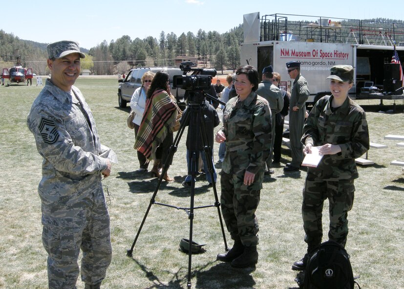 RUIDOSO, N.M. -- Airman 1st Class Katerina Slivinske and Airman 1st Class Rachel Kocin, 49th fighter wing public affairs enjoy a casual moment with Chief Jeff Cui, 49th fighter wing command chief, during the Military Appreciation Weekend here Apr. 12. (U.S. Air Force photo by Captain Rodney McNany)