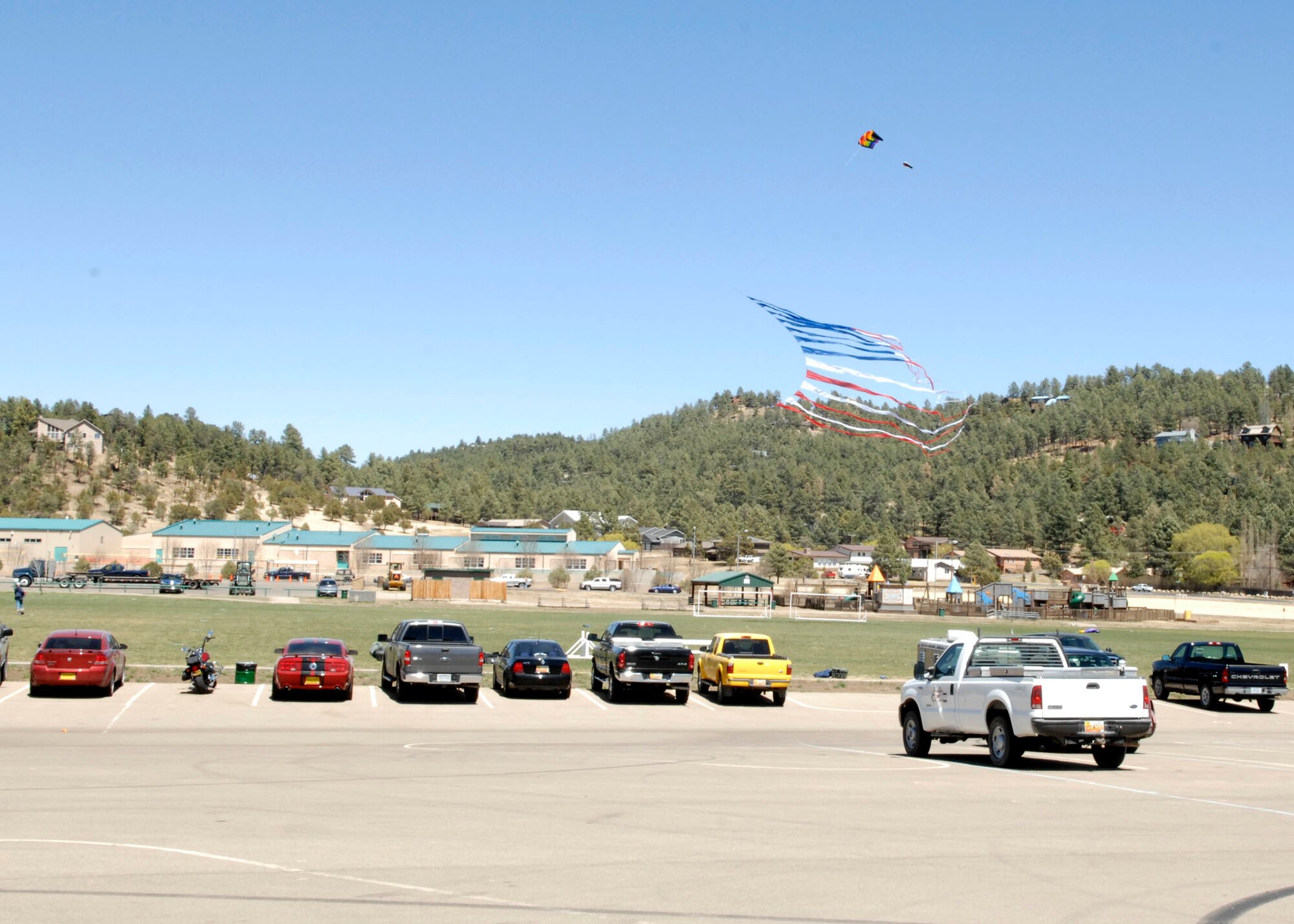 RUIDOSO, N.M. --An American flag shaped kite flies in the sky during the Military Appreciation Weekend here  Apr. 11. (U.S. Air Force photo/Airman 1st Class Rachel A. Kocin)