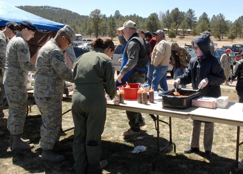RUIDOSO, N.M. --Military member's from Holloman Air Force Base, N.M., receive free food during the Military Appreciation Weekend here.  Apr. 11. The Airmen were part of the initial set up crew for the MAW. (U.S. Air Force photo/Airman 1st Class Rachel A. Kocin)
