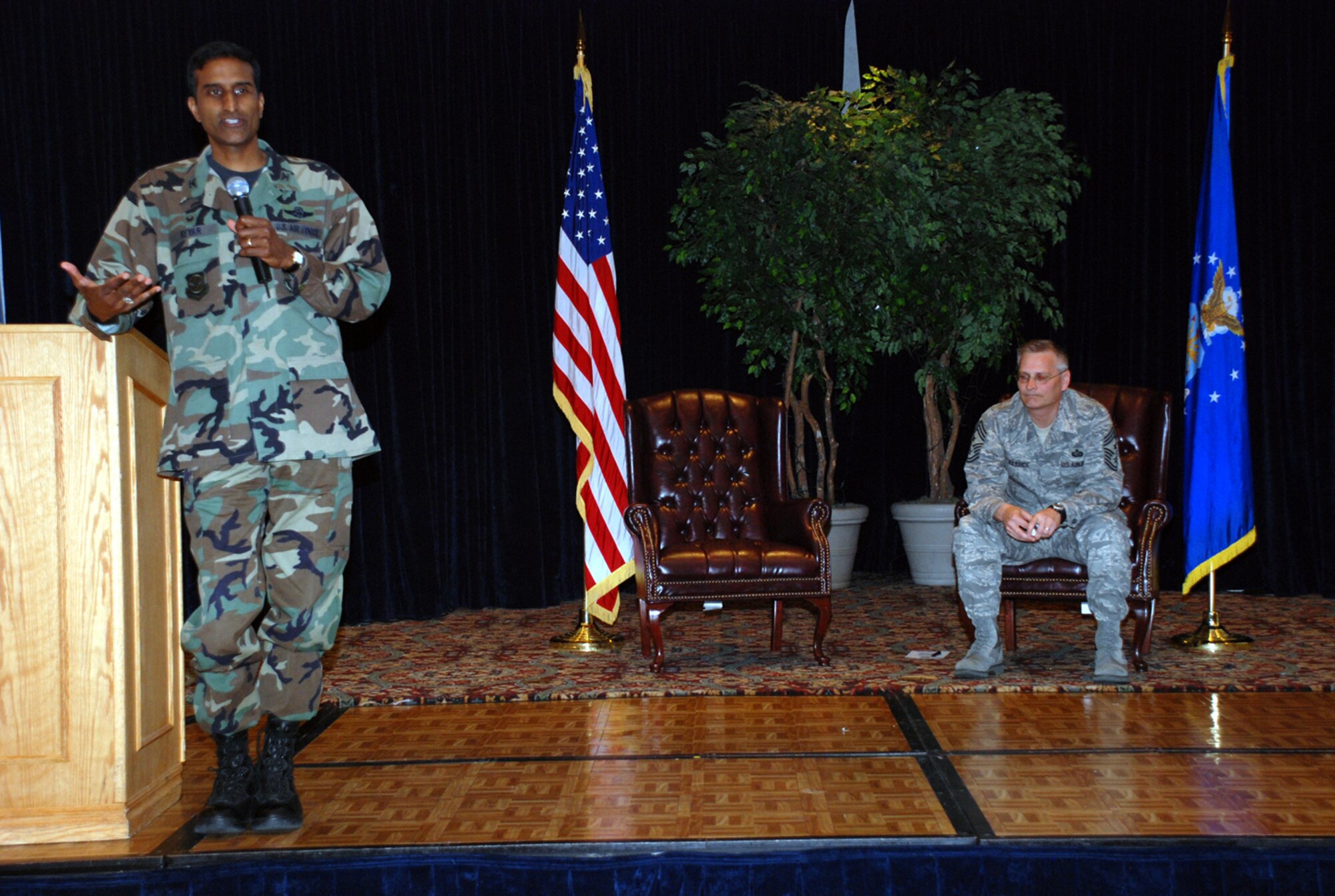 Left, Col. Balan Ayyar, 305th Air Mobility Wing commander, bids farewell to Chief Master Sgt. Scott Kilbride, 305 AMW command chief, April 18 at The Club here. Team McGuire members gathered for a luncheon to celebrate the chief’s accomplishments here as he prepares to move on to Maxwell-Gunter AFB, Ala. (U.S. Air Force photo/Airman 1st Class Rebekah Phy)  