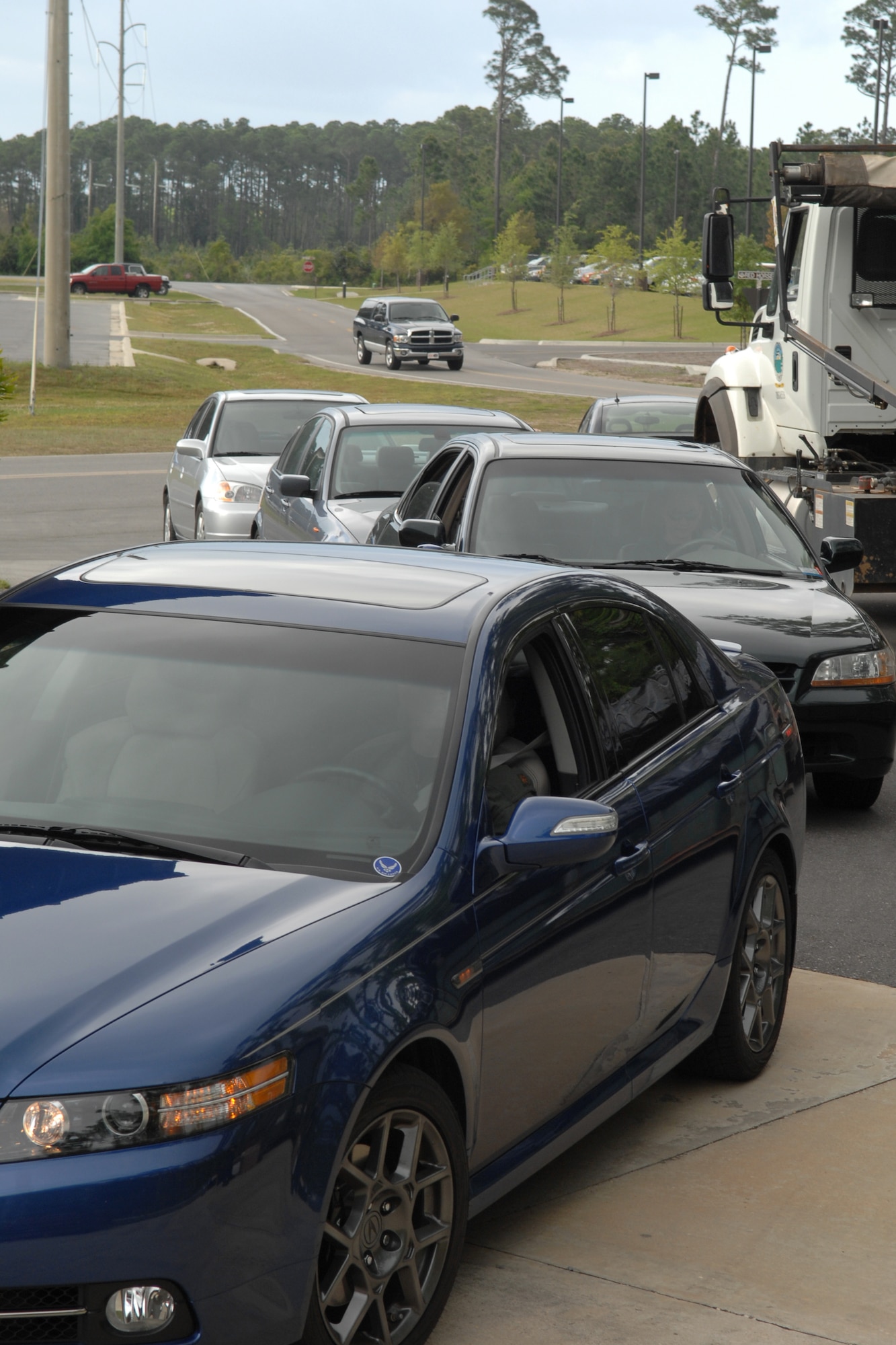 Hurlburt Field employees and residents lined up at the hazardous waste collection facility on base to drop off their hazardous items during the semi-annual household hazardous waste collection day April 18. This service is offered twice a year in April and October and gives employees and residents of Hurlburt a chance to properly dispose of hazardous items such as paint, autmobile chemicals and flourescent light bulbs. (U.S. Air Force photo/Senior Airman Sheila deVera)