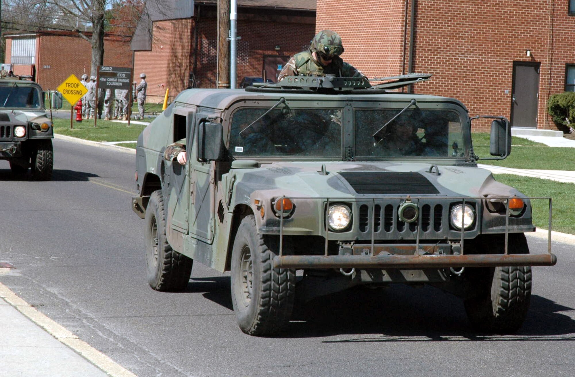 Students in the Advanced Contingency Skills Training Course 08-4 drive HMMWVs in a convoy en route to convoy training on Fort Dix, N.J., April 15, 2008.  The course, taught by the U.S. Air Force Expeditionary Center's 421st Combat Training Squadron, prepares Airmen for upcoming deployments.  (U.S. Air Force Photo/Tech. Sgt. Scott T. Sturkol)