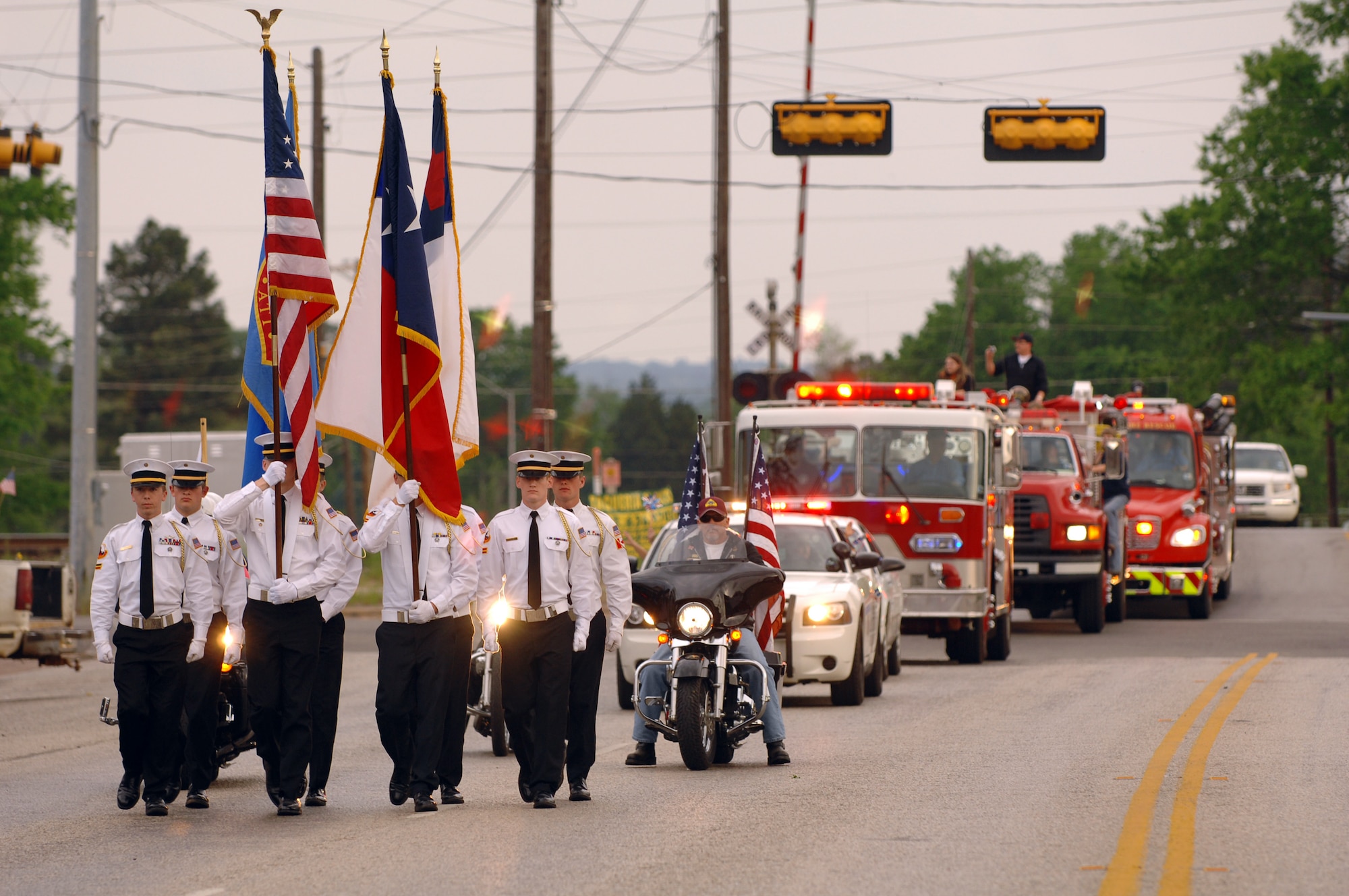 A hometown hero parade travels through the streets of Hawkins, Texas, on April 17th, in honor of two of its residents from 307th RED HORSE Squadron who recently returned from Iraq. Tech. Sgt. Michael McComb and Staff Sgt. Cynthia Karch were honored with not only a parade, but a week in their honor celebrated yearly, and an outpouring of love from their friends and neighbors. (U.S. Air Force photo by Airman 1st Class Joanna M. Kresge)