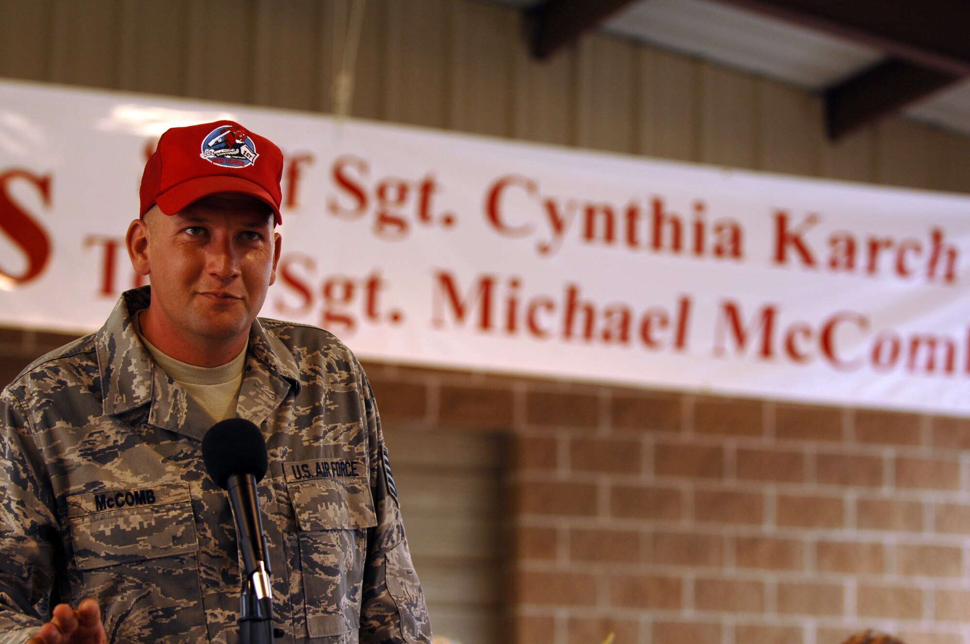 Tech. Sgt. Michael McComb 307th RED HORSE Squadron gives a speech to his friends and neighbors of Hawkins, Texas, on April 17th. A parade and award presentation was held for Sergeant McComb and Staff Sgt. Cynthia Karch who are both members of RHS and residents of Hawkins. (U.S. Air Force photo by Airman 1st Class Joanna M. Kresge)