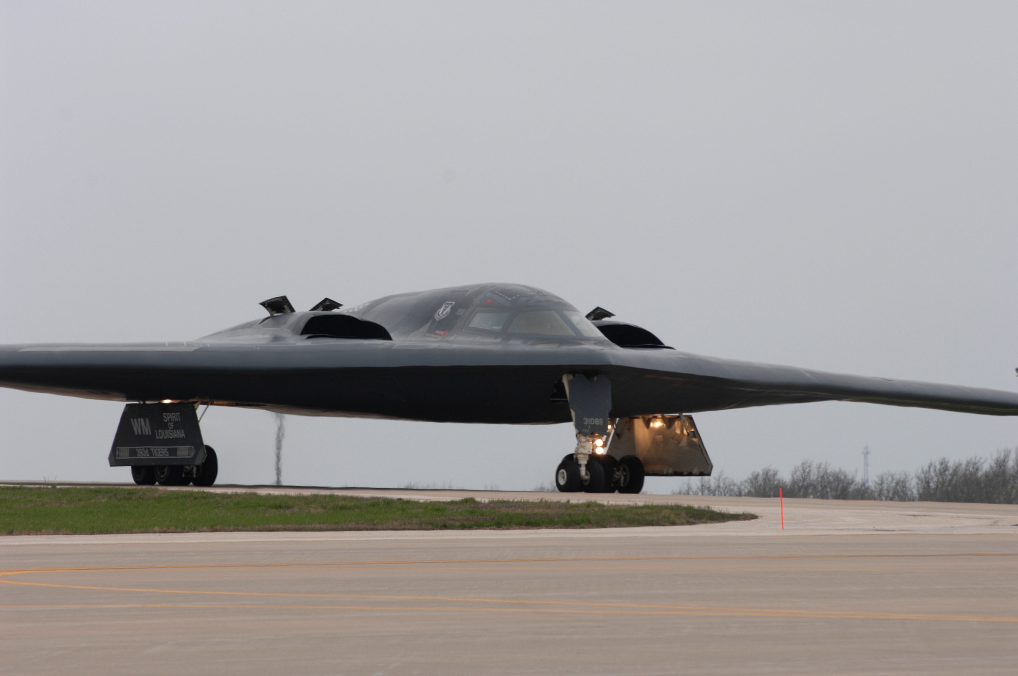 WHITEMAN AIR FORCE BASE, Mo., - The B-2 “Spirit of Louisiana” flown by Lt. Col. Frank Cavuoti, mission commander, and Capt. Todd Moenster, pilot, taxi to the runway Apr. 17. The B-2 returned to flying April 15 following a 53-day safety pause, after the first-ever crash Feb. 23 in Guam. (U.S. Air Force photo/Tech. Sgt. Samuel A. Park)