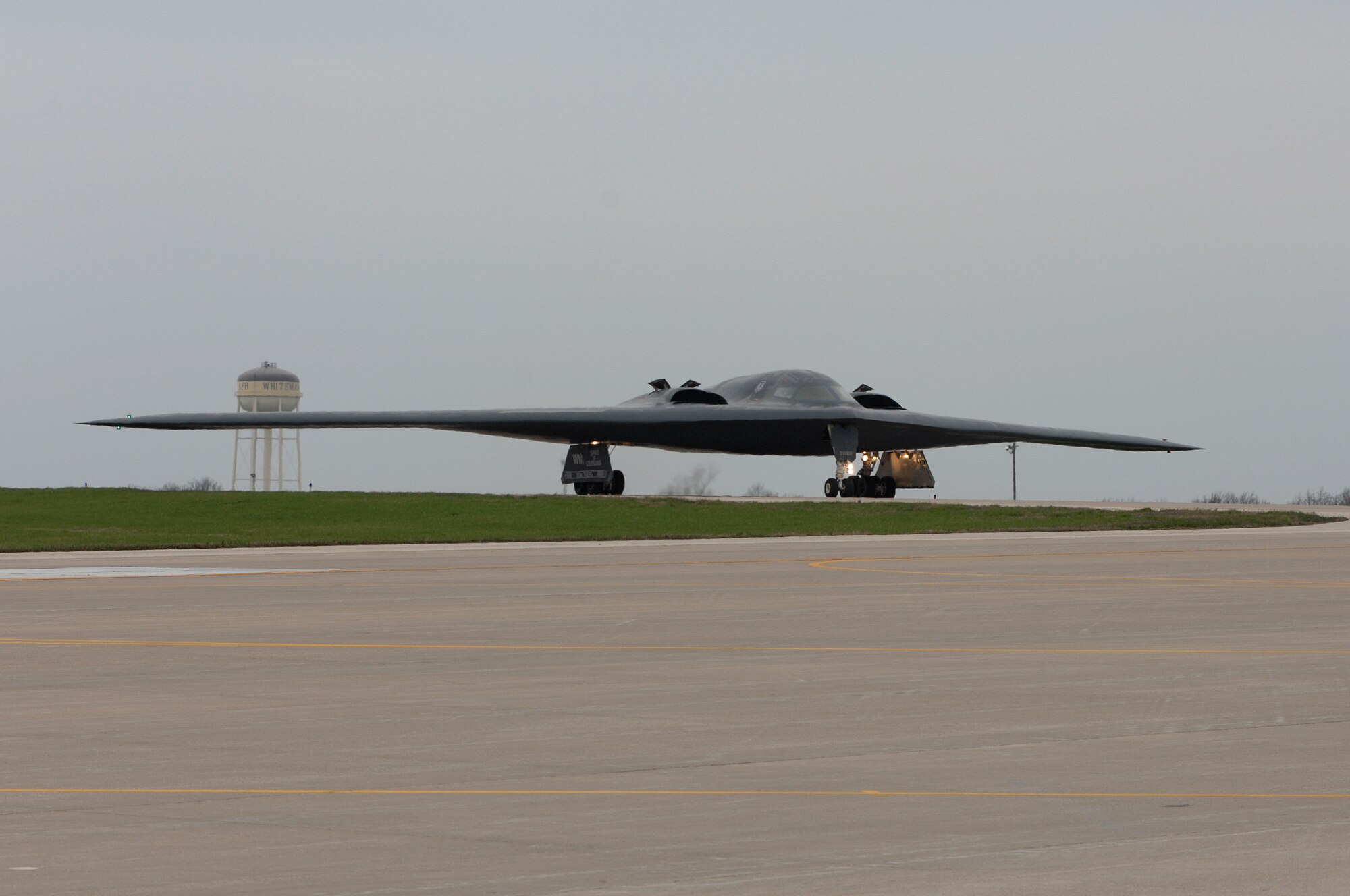 WHITEMAN AIR FORCE BASE, Mo., - The B-2 “Spirit of Louisiana” flown by Lt. Col. Frank Cavuoti, mission commander, and Capt. Todd Moenster, pilot, taxi to the runway Apr. 17. The B-2 returned to flying April 15 following a 53-day safety pause, after the first-ever crash Feb. 23 in Guam. (U.S. Air Force photo/Tech. Sgt. Samuel A. Park)