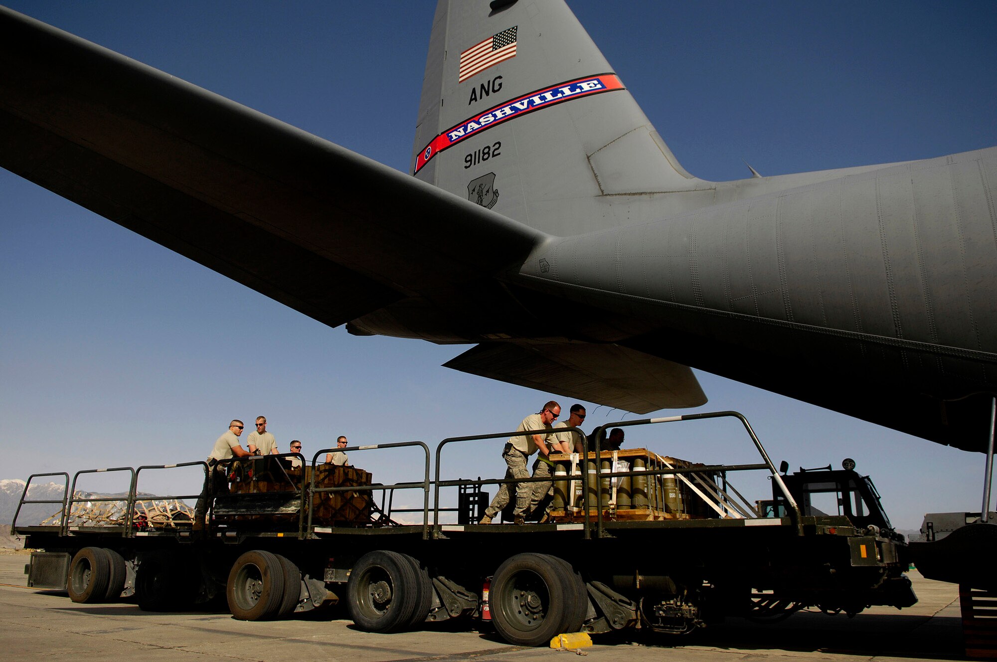 Airmen load cargo onto a C-130 Hercules for an Operation Enduring Freedom mission April 16 from Bagram Air Base, Afghanistan. Airmen are assigned to the 455th Expeditionary Logistics Readiness. (U.S. Air Force photo/Master Sgt. Andy Dunaway) 