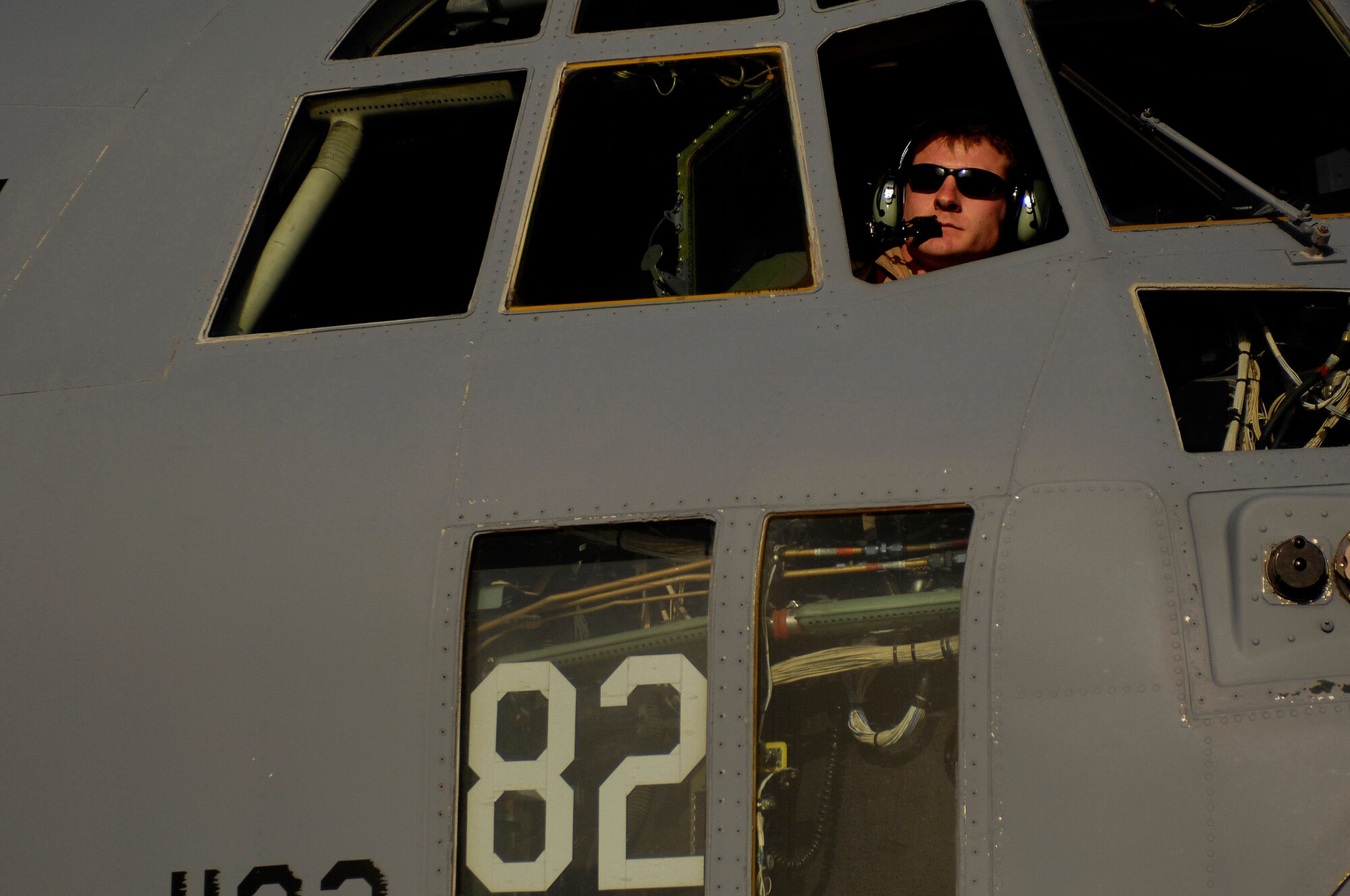 1st Lt. Ed Ladd checks the ramp prior to the engine start on a C-130 Hercules during an Operation Enduring Freedom mission April 16 from Bagram Air Base, Afghanistan. Lieutenant Ladd is a co-pilot assigned to the 774th Expeditionary Airlift Squadron and deployed from the 105th Airlift Squadron from Nashville, Tenn. (U.S. Air Force photo/Master Sgt. Andy Dunaway) 