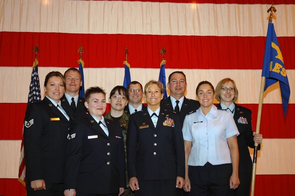 Lt. Col. Kathleen Flarity, 302nd Airlift Wing’s newest squadron commander stands with her new team during the standup and reactivation of the 34th Aeromedical Evacuation Squadron at Peterson Air Force Base on April 6, 2008. Currently the reserve recruiters are seeking applicants to join the squadron and fill the various career fields, which support the mission of the 34th AES. (U.S. Air Force photo/Tech. Sgt. David Morton)
