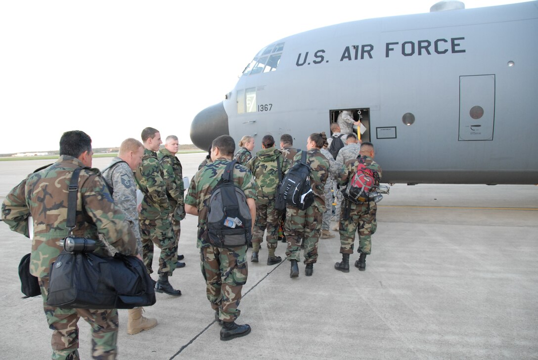 Members of the 149th Fighter Wing, Texas Air National Guard board a C-130 in route to Davis-Monthan Air Force Base in Tucson, Arizona on April 13, 2008. The 149th is participating in Coronet Cactus, an annual training exercise. (Air National Guard Photo by SSgt Andre Bullard) (RELEASED)