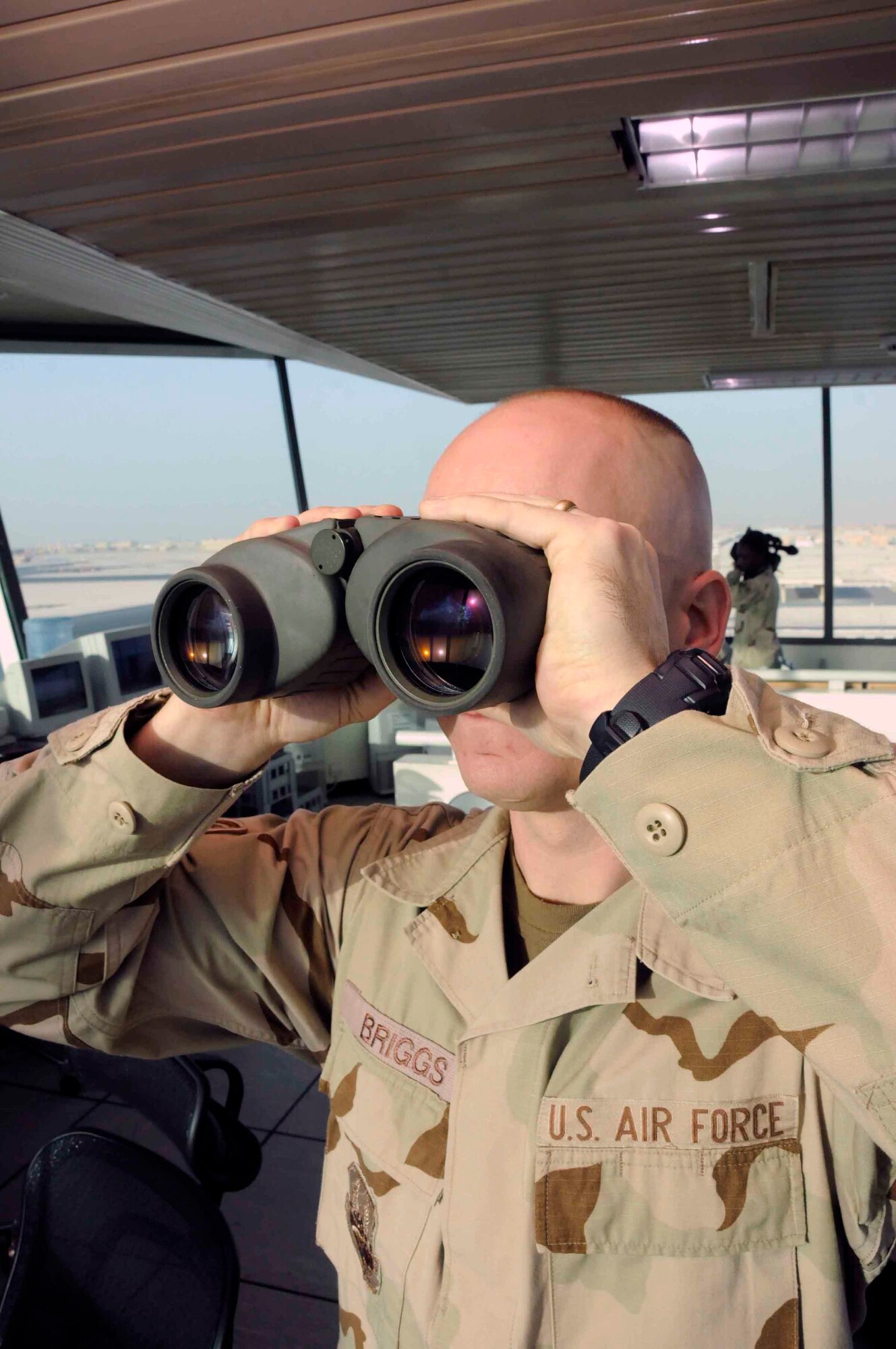 Tech. Sgt. Eric Briggs watches the flight line for incoming air traffic. Sergeant Briggs’ duties as an air traffic control supervisor include overseeing and assisting junior Airmen in the career field. (U.S. Air Force photo/Senior Airman Domonique Simmons)