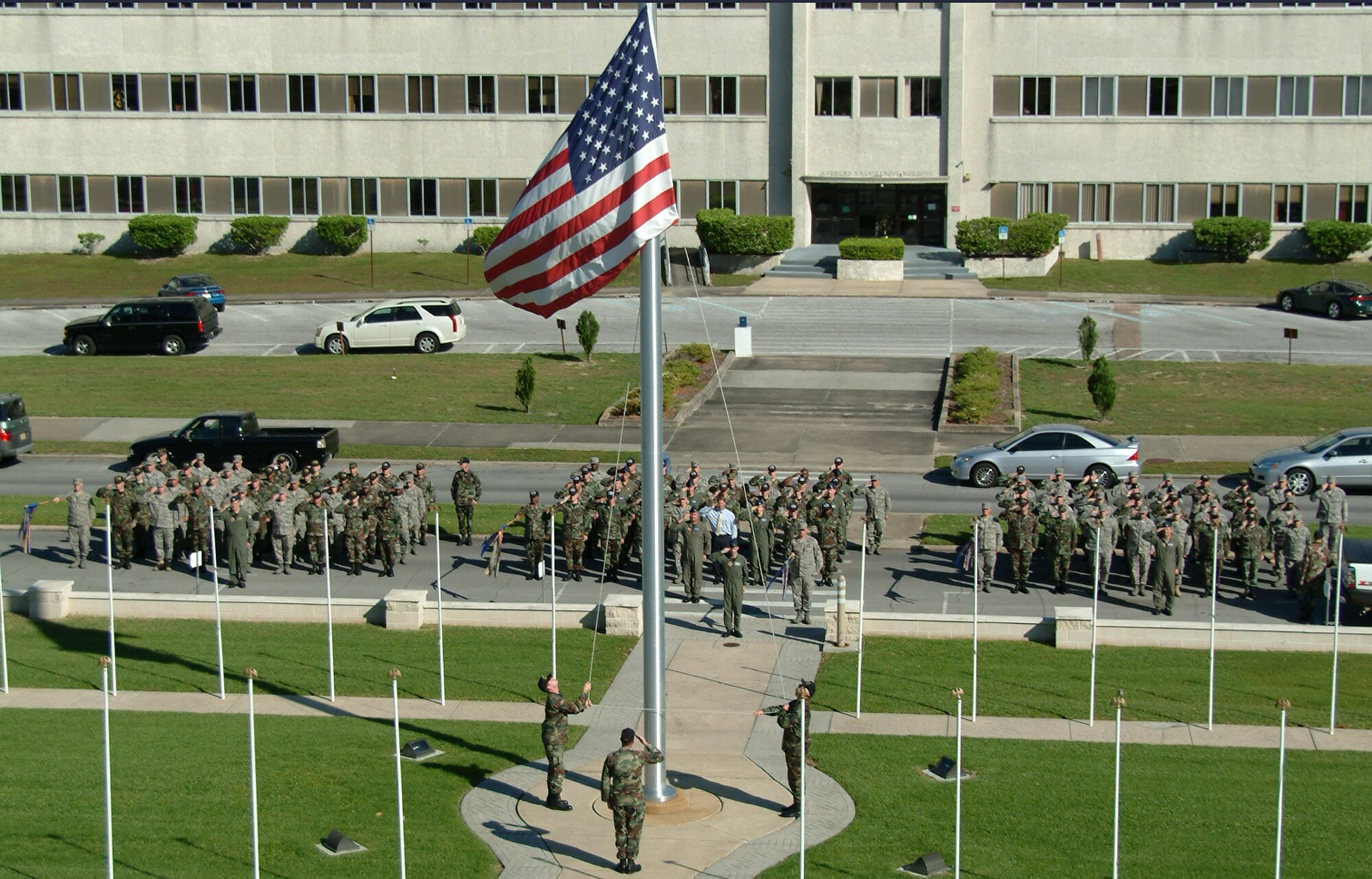 The base flag is lowered by the 53d Electronic Warfare Group flag detail during the retreat ceremony April 17 at Eglin Air Force Base.  The ceremony was performed solely by the 53d EWG and its squadrons – the 16th Electronic Warfare Squadron, 36th Electronic Warfare Squadron and the 68th Electronic Warfare Squadron. This is the last base retreat ceremony the EWG will perform as part of the 53d Wing.  By October, the group will transition to Air Force Cyber Command.  Photo by Staff Sgt. Samuel King Jr.