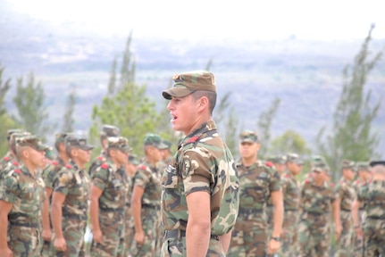 SOTO CANO AIR BASE, Honduras--A Honduran cadet barks orders during a formation at the Honduran Military Training Academy in Tegucigalpa, Honduras April 16. During Joint Task Force-Bravo?s information exchange at the academy, the academy staff explained that rigorous physical and academic standards are expected of the cadets. More than 170 freshmen cadets began training in January but only approximately 80 remain.  (U.S. Air Force photo by Tech. Sgt. William Farrow) 