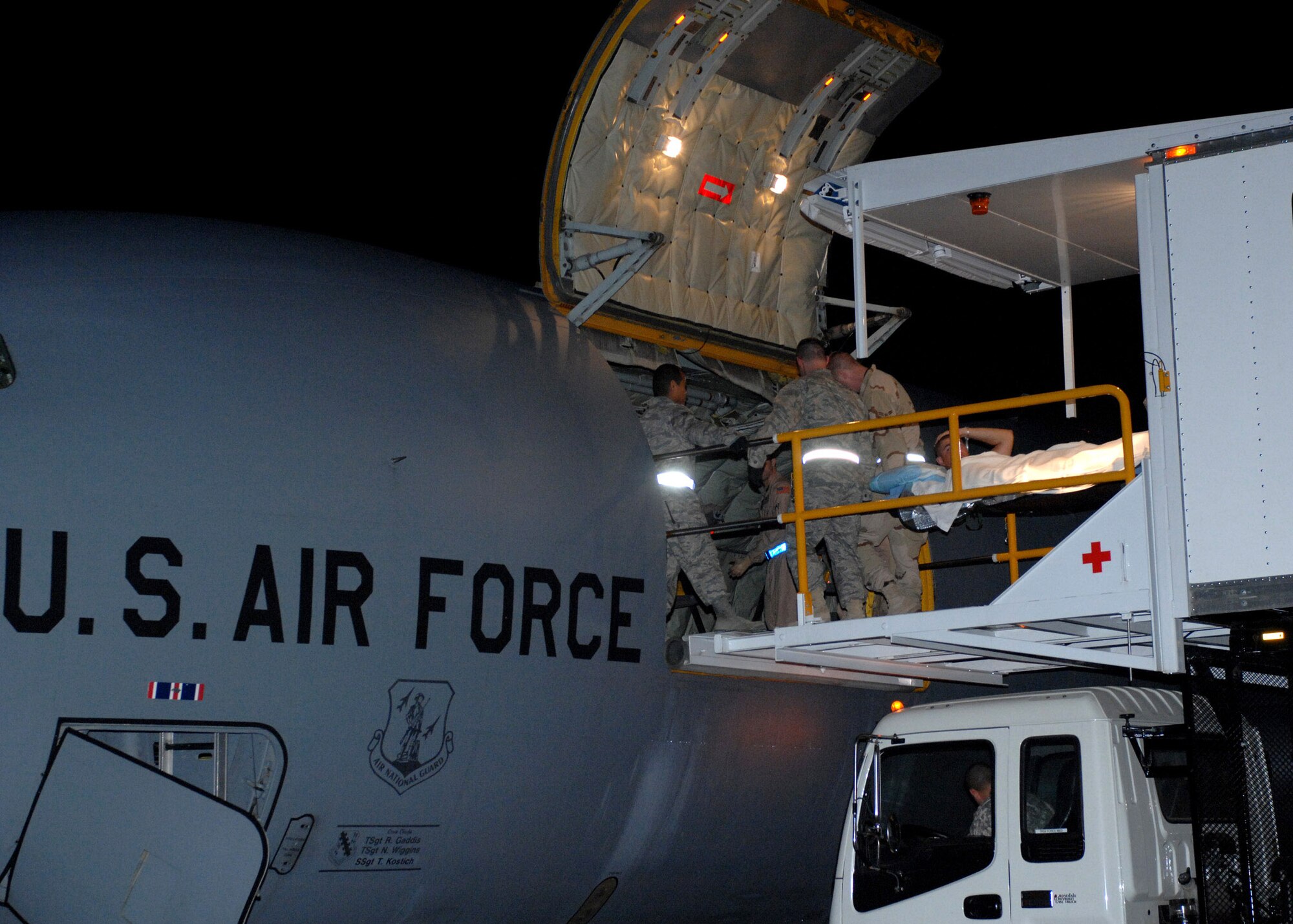 An Air Force high deck patient loading platform was used here April 9 to transfer patients to Landstuhl Army Regional Medical Center, Germany. The new HDPLP, a special-purpose vehicle which limits the time a patient is exposed to outside elements, is one of three vehicles in the Air Force inventory. (U.S. Air Force photo/Master Sgt. Demetrius Lester)
