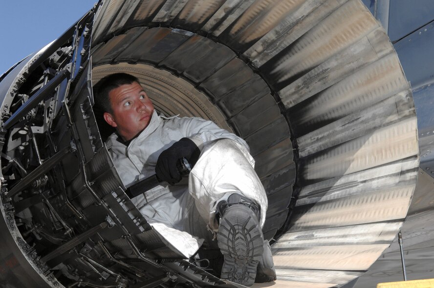 Staff Sgt. Charles Sparks inspects the exhaust of an F-15E Strike Eagle April 9 at Nellis Air Force Base, Nev. He is with the 391st Aircraft Maintenance Unit at Mountain Home AFB, Idaho, which goes to Nellis AFB every two years to provide advisory support aircrew training. (U.S. Air Force photo/Senior Airman Larry E. Reid Jr.)