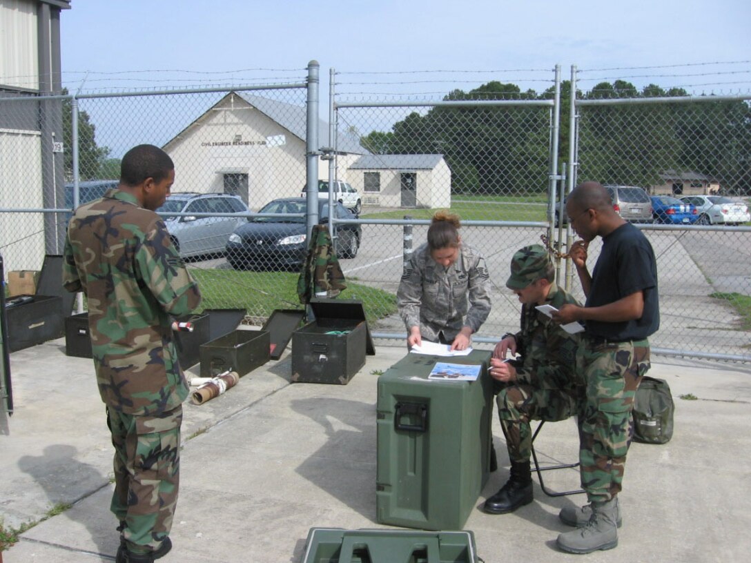 SEYMOUR JOHNSON AIR FORCE BASE, N.C. -- Reservists with the 916th Communication Squadron take inventory of communication equipment and ensure the equipment is in operable order. The inventory comes prior to a wing-wide exercise scheduled for the May unit training assembly. From left to right are: Airman First Class Kristopher Matthews, Master Sgt. Jennifer Conway, Master Sgt. Will Cook and Tech. Sgt. TJ Brown