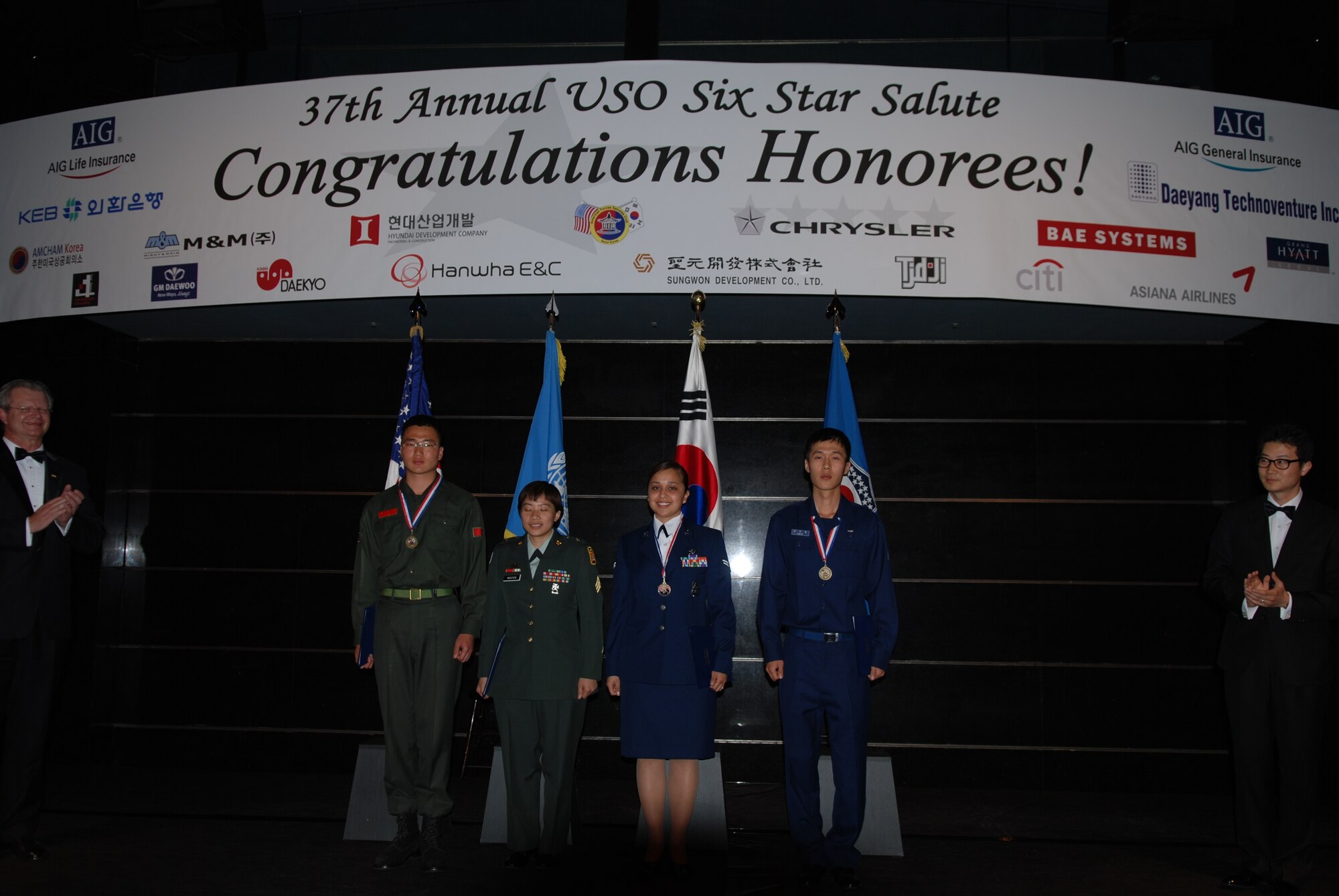 SEOUL, Republic of Korea -- Airman 1st Class Jannette Meireles, 8th Security Forces Squadron town patrol member, received a $2,500 scholarship April 17 while attending the United Service Organization Six-Star-Salute banquet. (U.S. Air Force photo/Lt. Col. Rene White) 