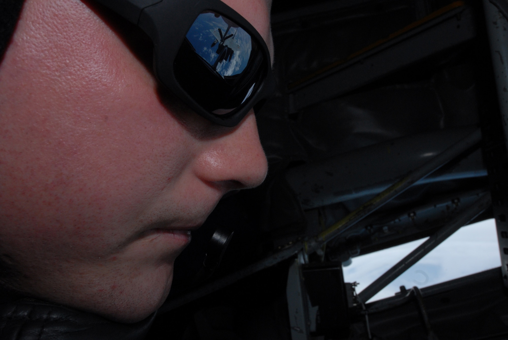 Senior Airman Christopher Pedersen, 909th Air Refueling Squadron, uses the boom to refuel a Japan Air Self Defense Force F-15 during training at Kadena Air Base, Japan. The training was conducted to familiarize JASDF members with U.S. Air Force refueling procedures. (U.S.photo/Staff Sergeant Darnell T. Cannady)