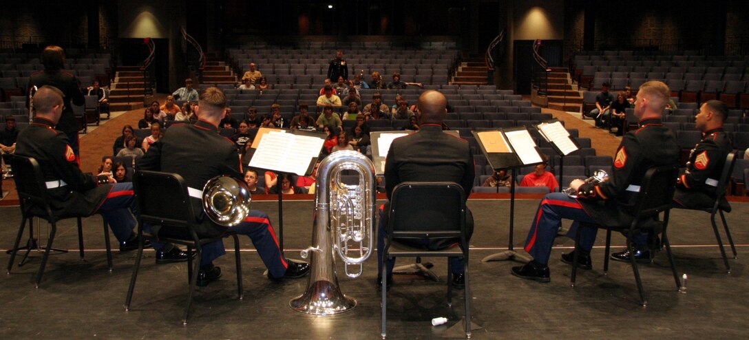 Members of the brass quintet from the Marine Corps Air Ground Combat Center Twentynine Palms, Calif., perform at Thornapple-Kellogg High School, Kalamazoo, Mich. April 22. The quintet went on a five-day tour of Recruiting Station Lansing April 21-25, performing for the public and offering clinics for students.