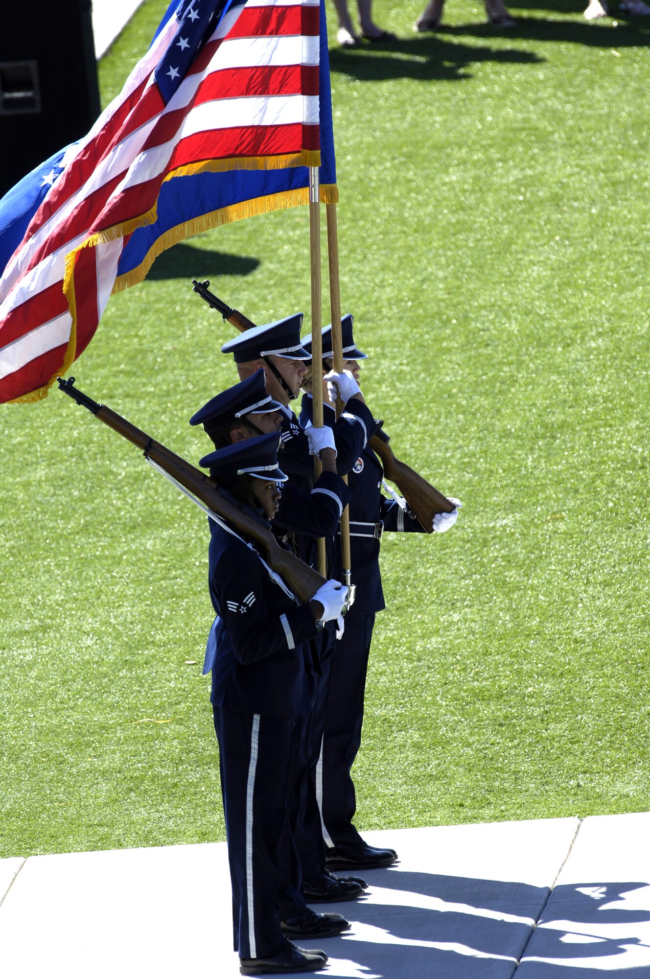 Members of the Holloman present the colors at the Sunset Stealth retirement ceremony at Holloman AFB, N.M., 21 April 2008.The F-117A flew under the flag of the 49th Fighter Wing at Holloman Air Force Base, New Mexico from 1992 to its retirement in 2008. (U.S. Air Force Photo by SSgt Jason Colbert)