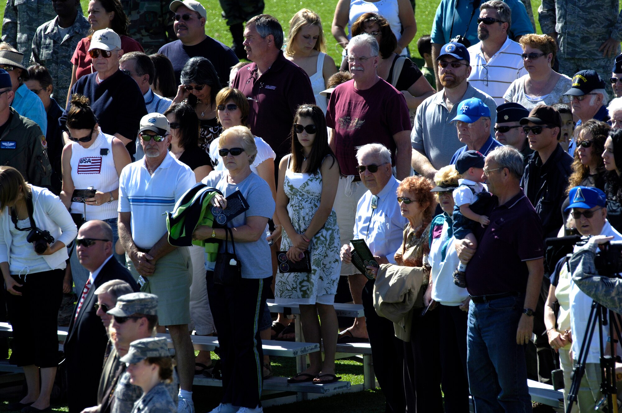 Members of the Holloman community gather to observe the Sunset Stealth retirement ceremony at Holloman AFB, N.M., 21 April 2008.The F-117A flew under the flag of the 49th Fighter Wing at Holloman Air Force Base, New Mexico from 1992 to its retirement in 2008. (U.S. Air Force Photo by SSgt Jason Colbert)